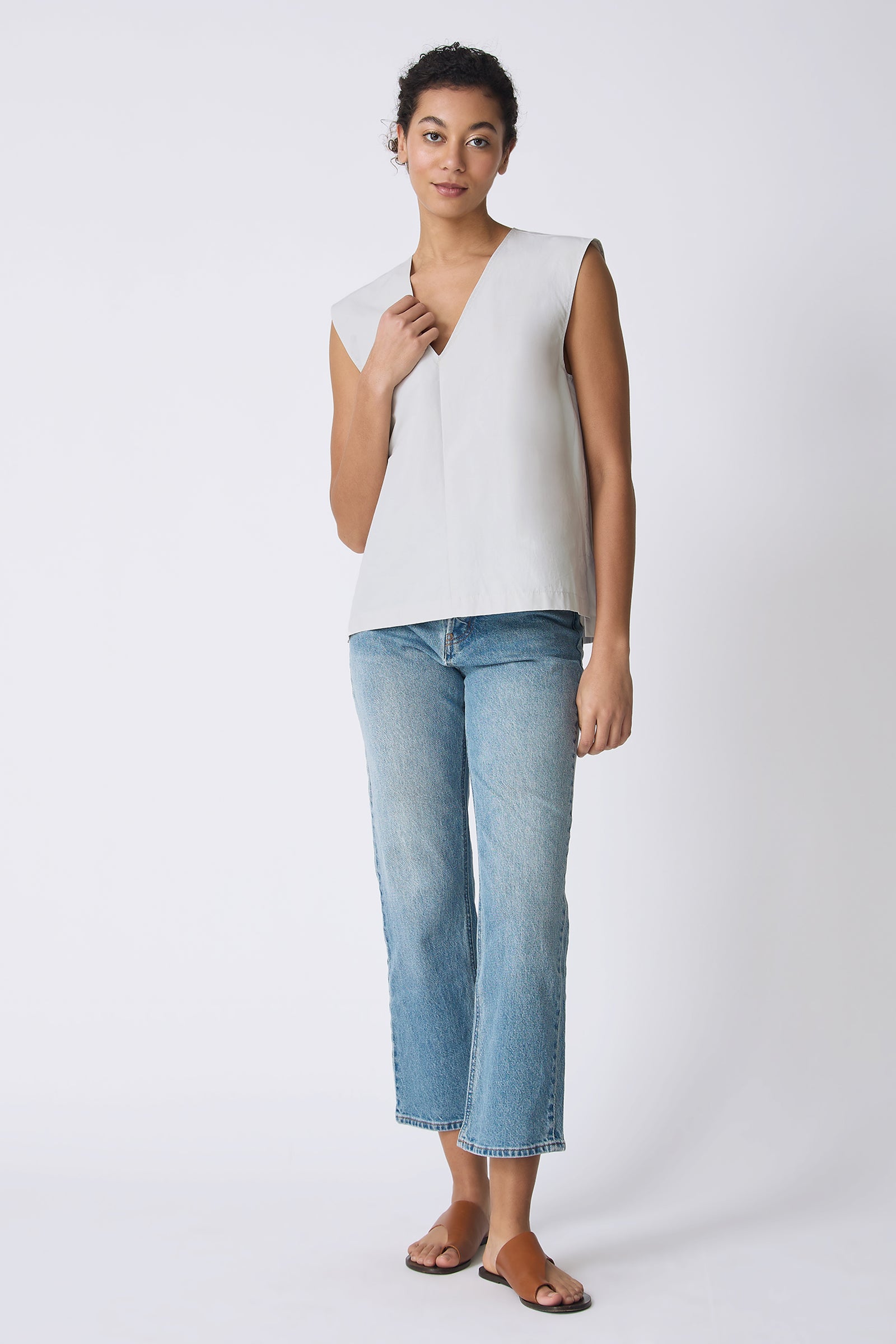 Kal Rieman Ava V-Neck Shell in Stone on model touching v-neck full front view