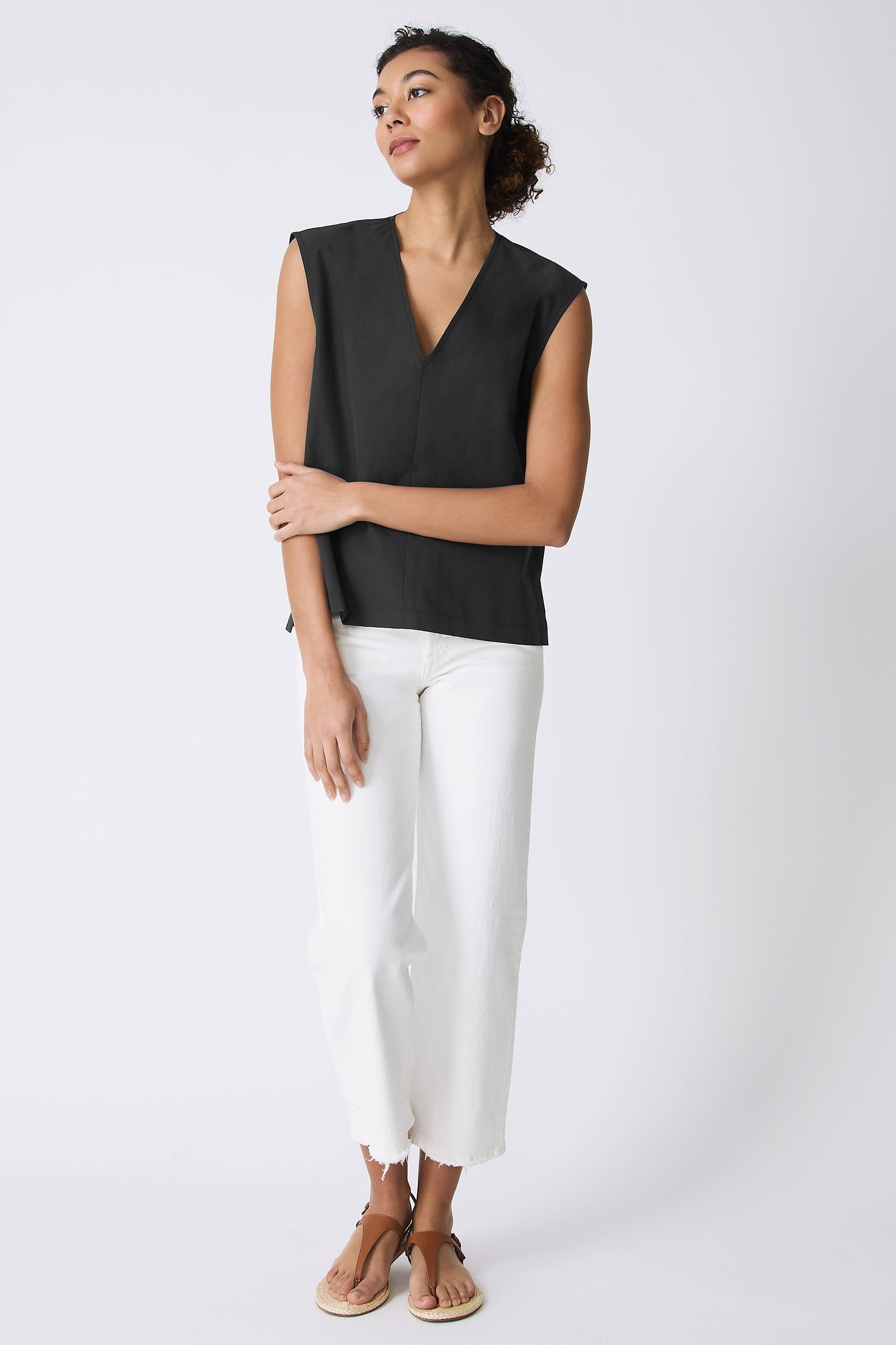 Kal Rieman Ava V-Neck Shell in Black on model touching arm full front view