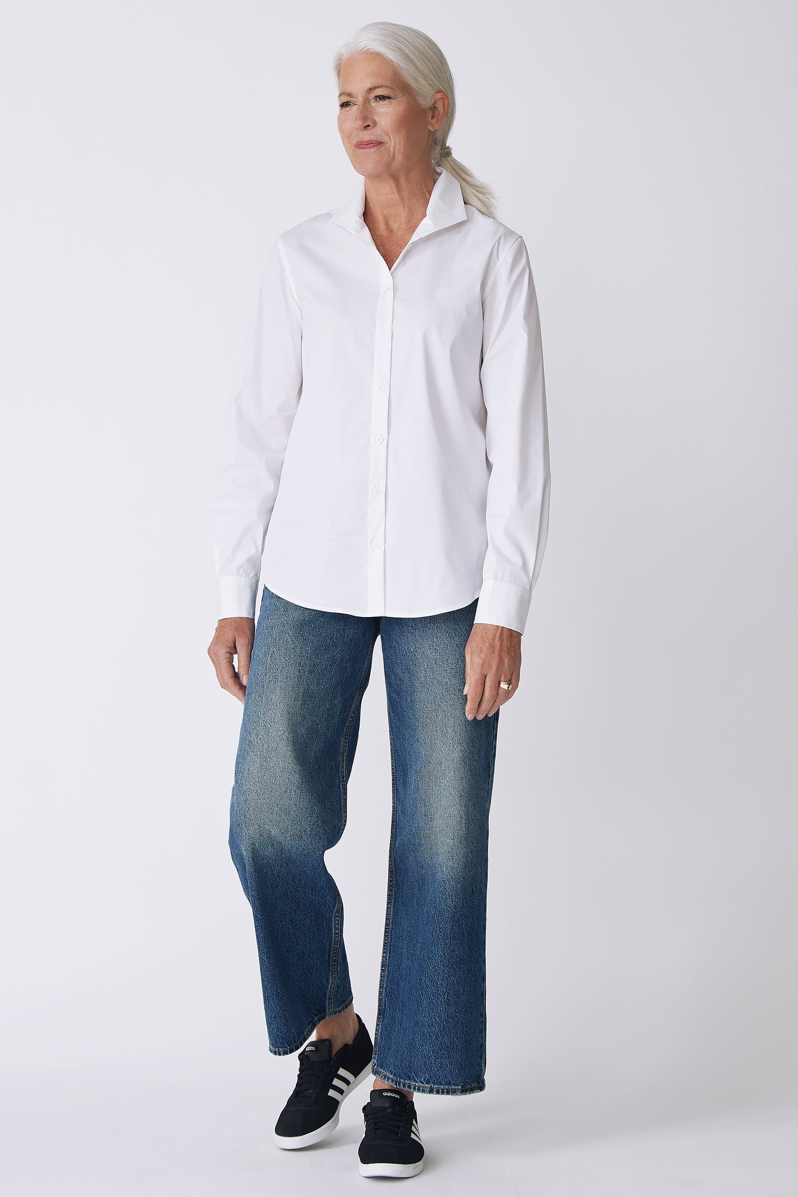 Kal Rieman Ginna Box Pleat Shirt in White Stretch on Model front view walking