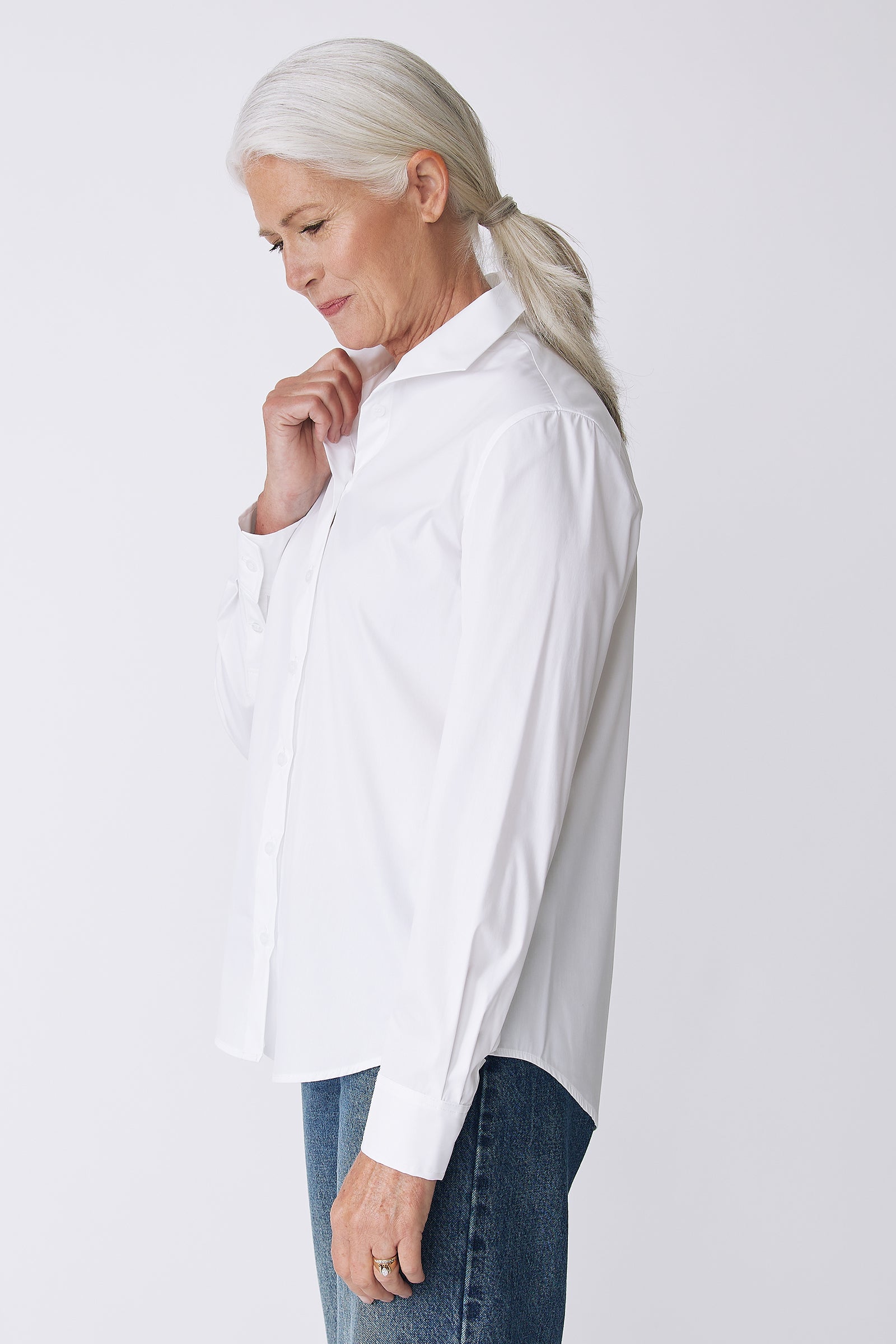 Kal Rieman Ginna Box Pleat Shirt in White Stretch on Model Side view holding collar