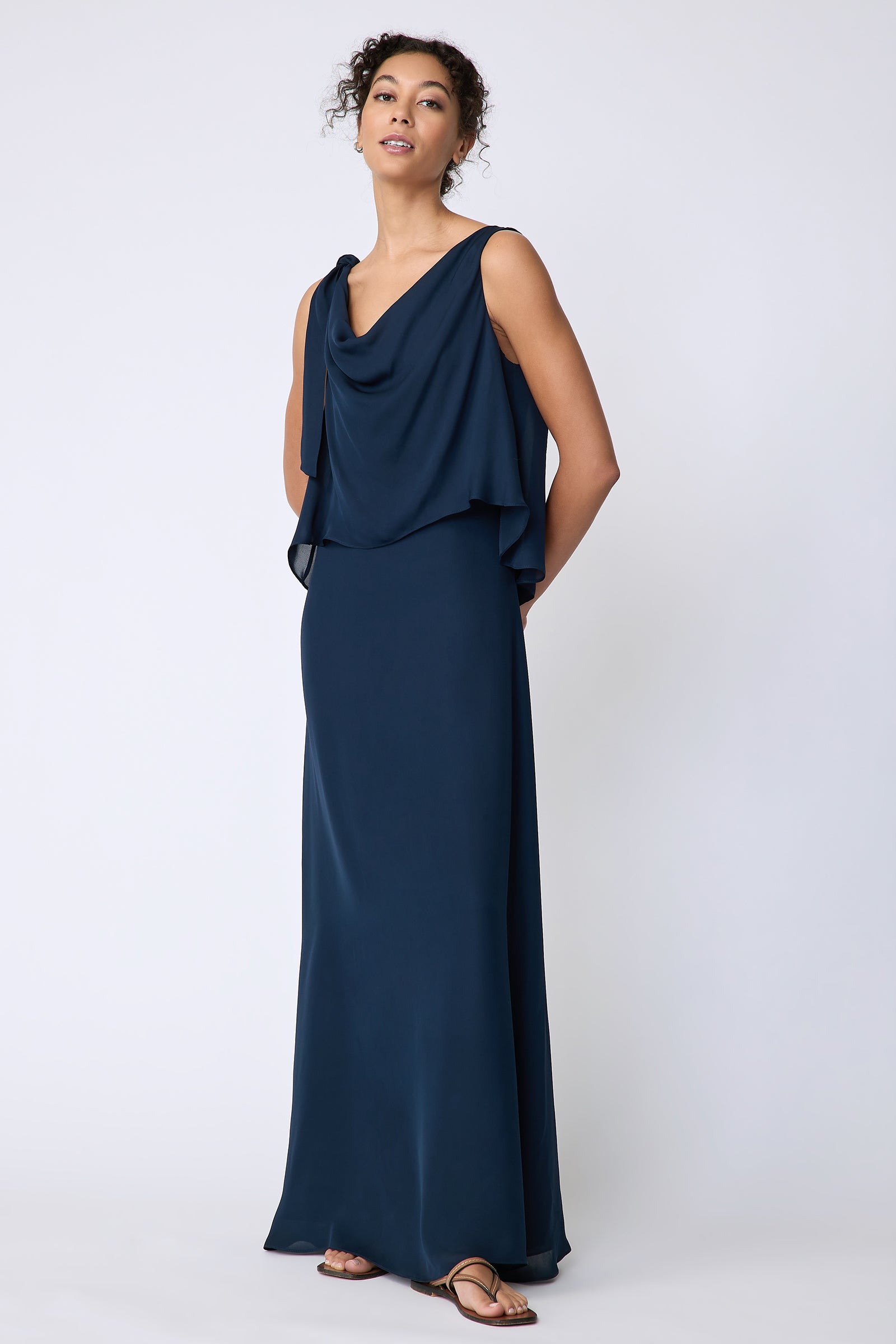 Kal Rieman Ada Gown in navy silk georgette on model front view hands behind back