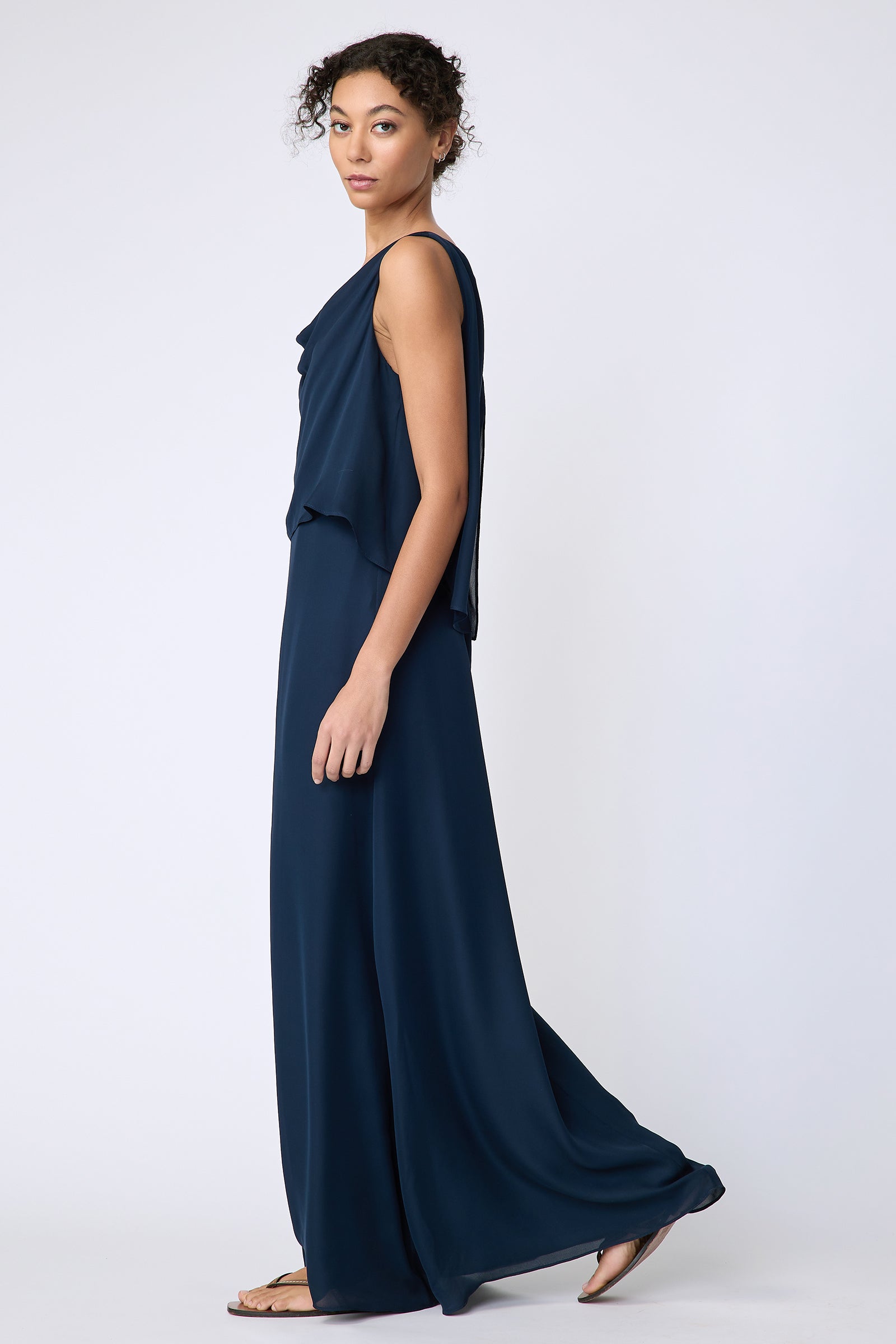 Kal Rieman Ada Gown in navy silk georgette on model side view walking
