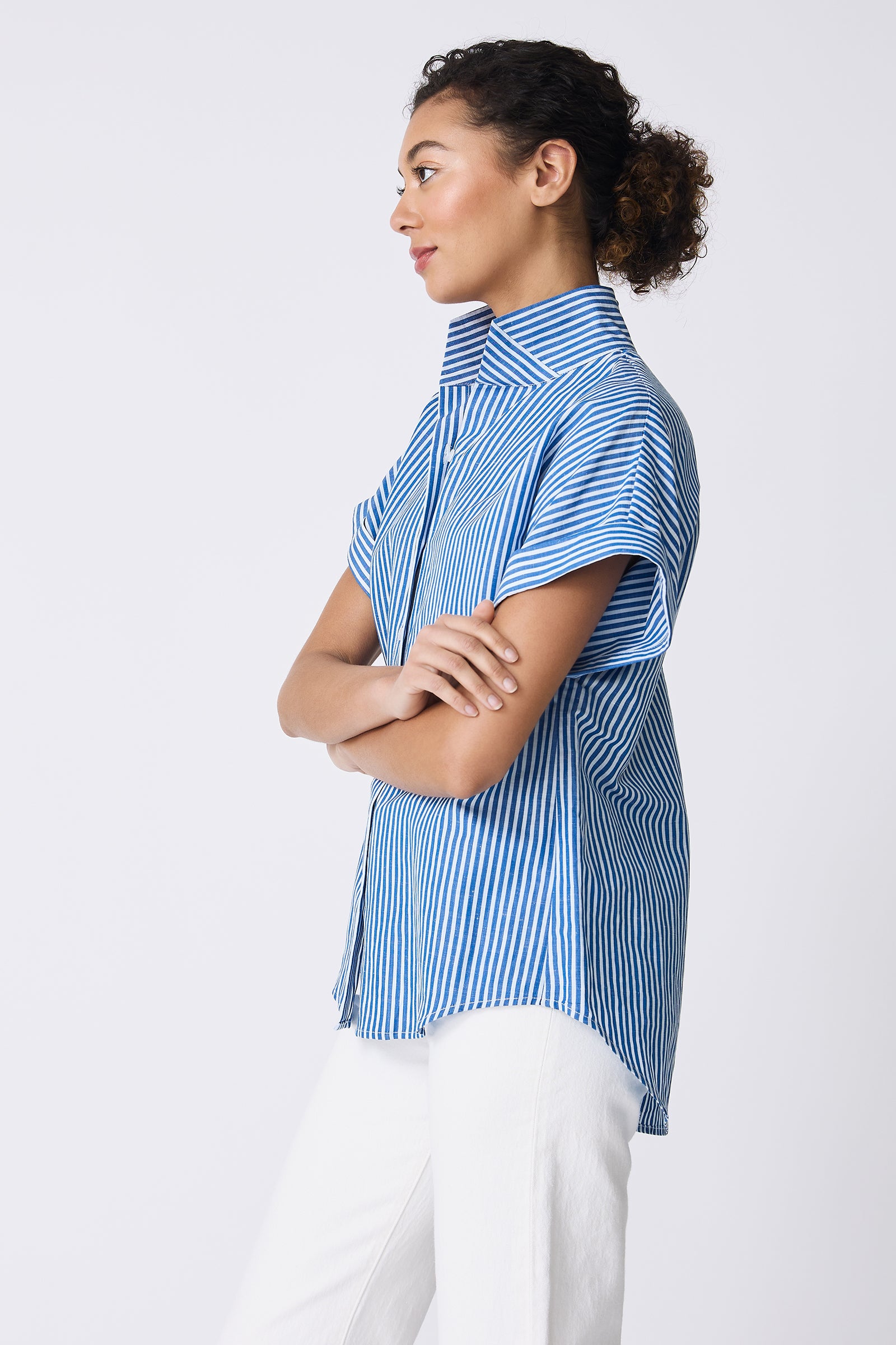 Kal Rieman Ali Kimono in Cabana Stripe Blue on model with arms crossed side view