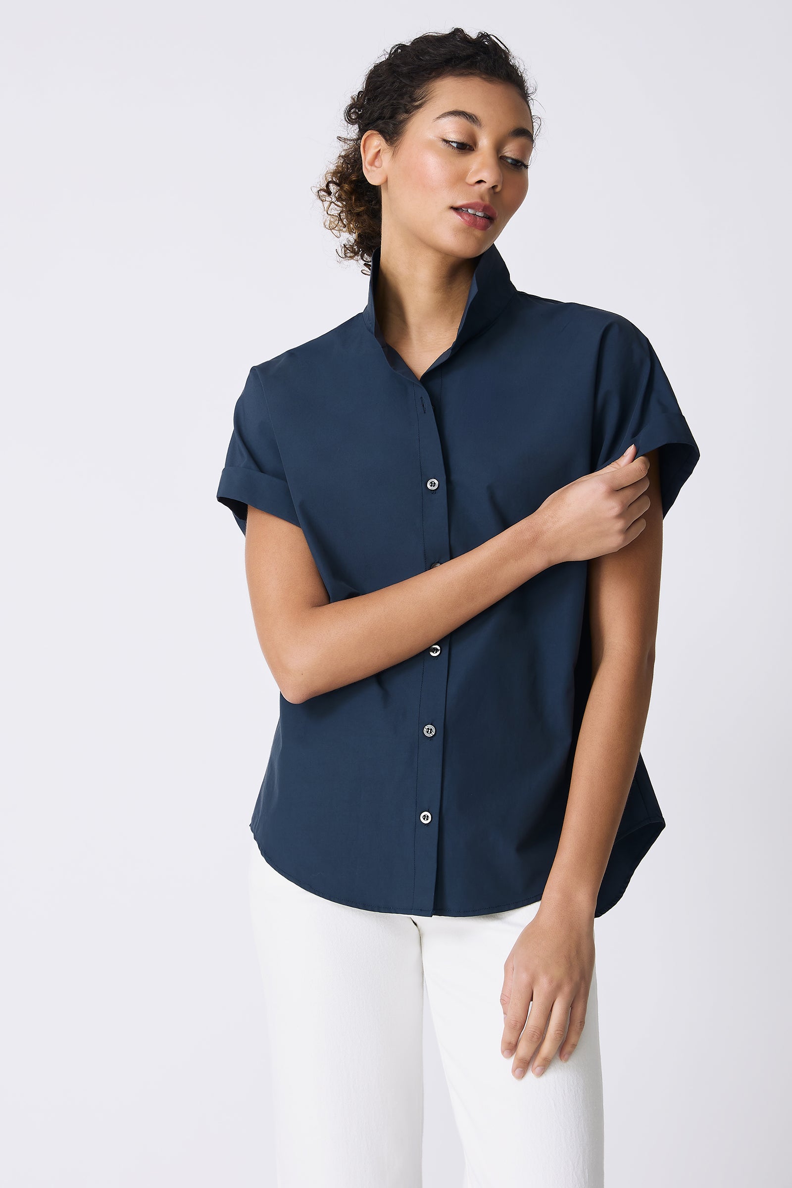 Kal Rieman Ali Kimono Top in Summer Navy on model touching shirt front view