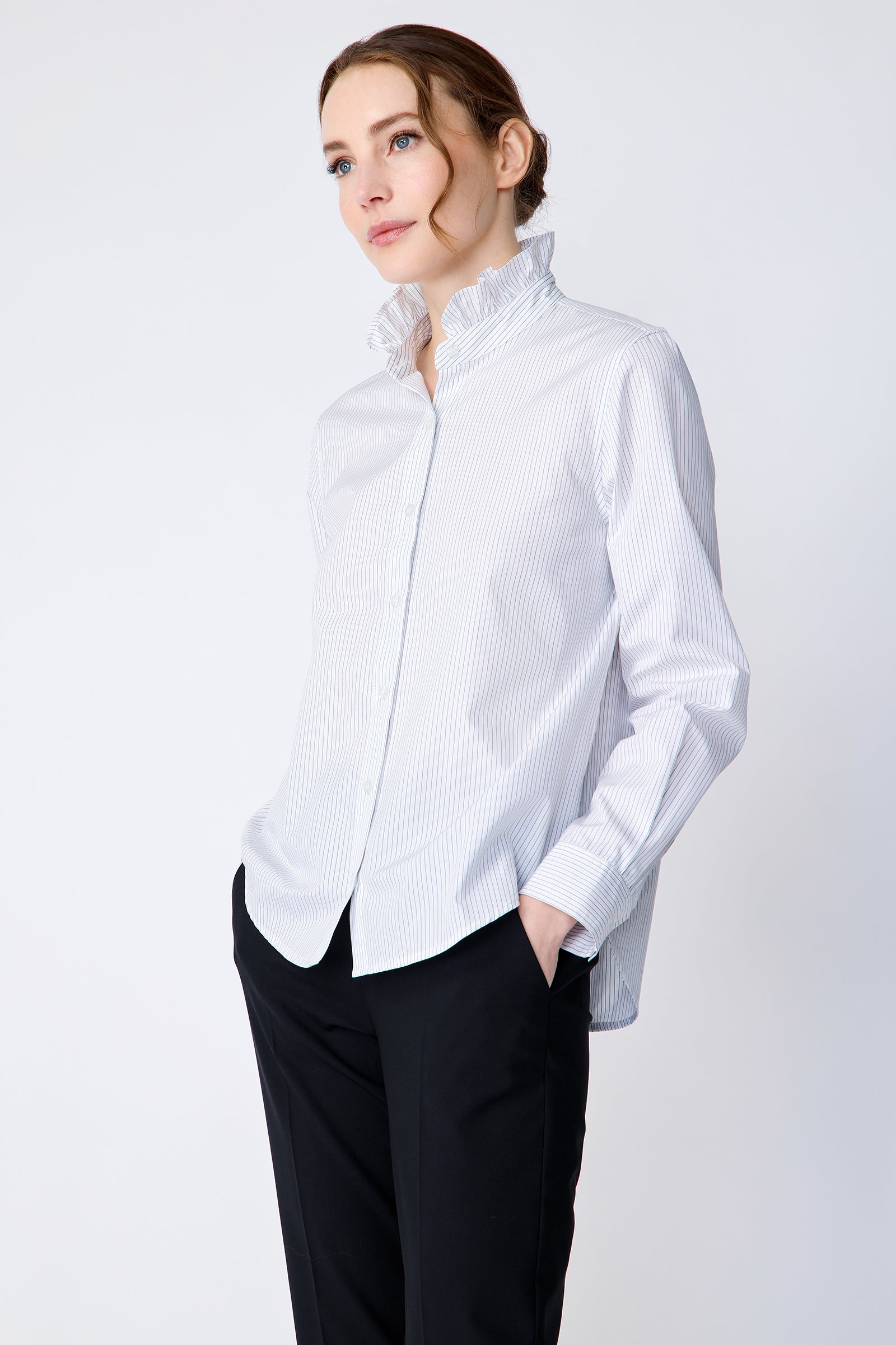 Kal Rieman Amy Ruffle Collar Shirt on model three quarter view hands in pockets