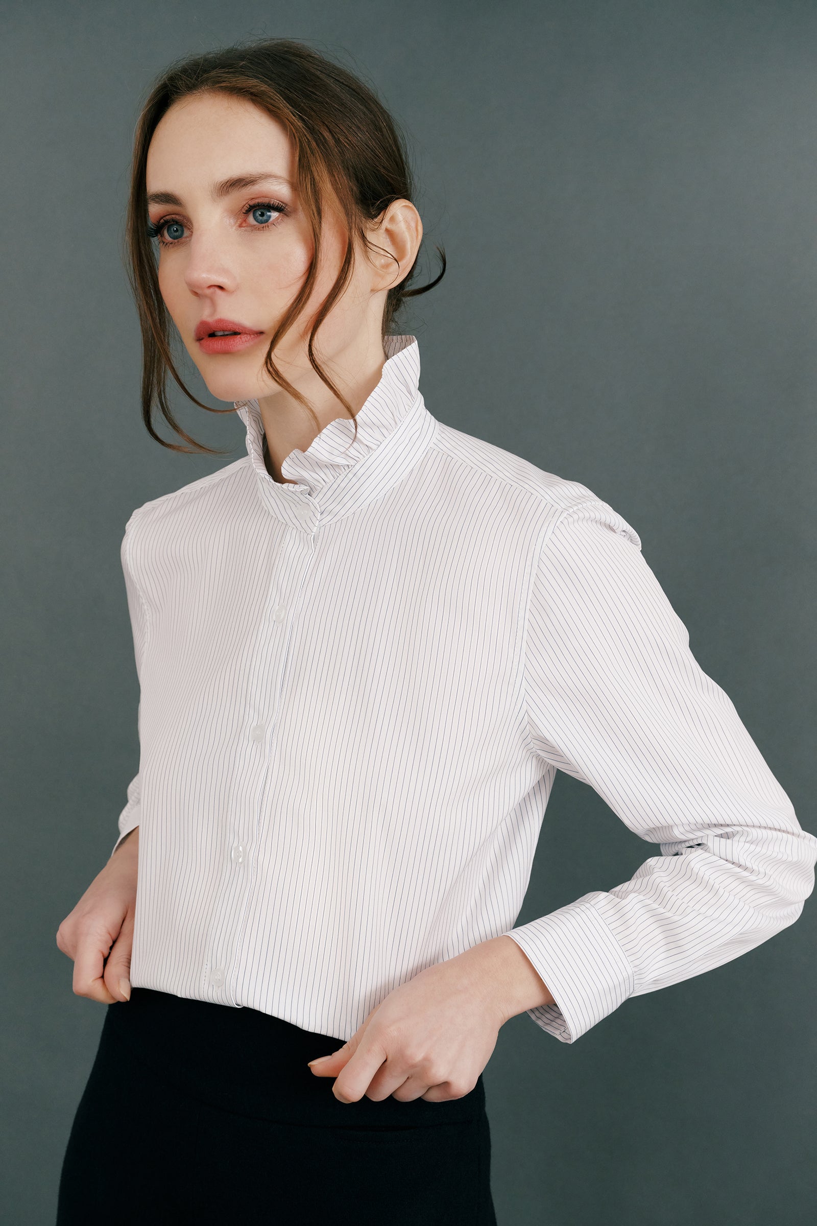 Kal Rieman Amy Ruffle Collar Shirt on model side view hands in pockets
