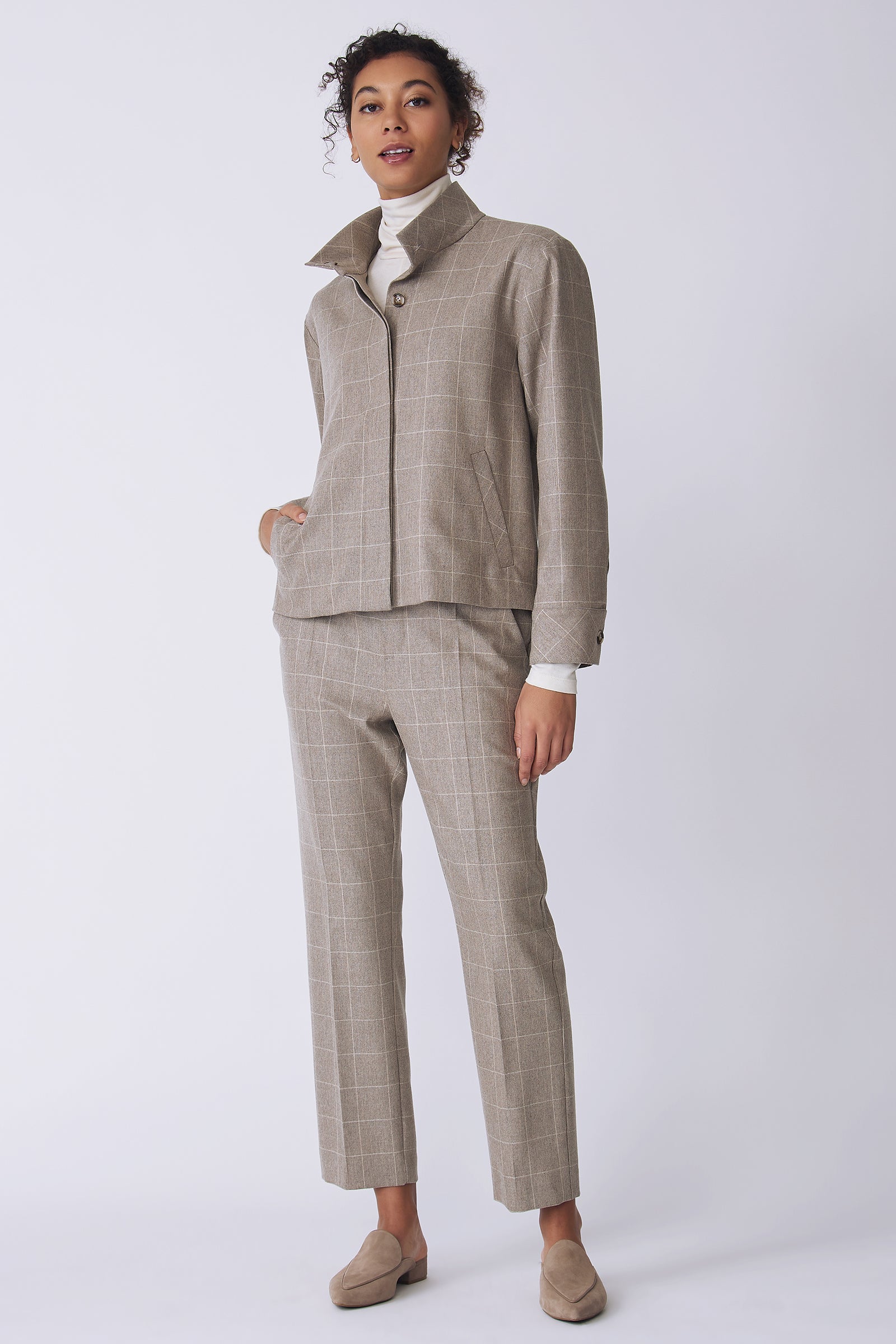 Kal Rieman Ashton Jacket in Italian Windowpane on model front view with hand in pant pocket
