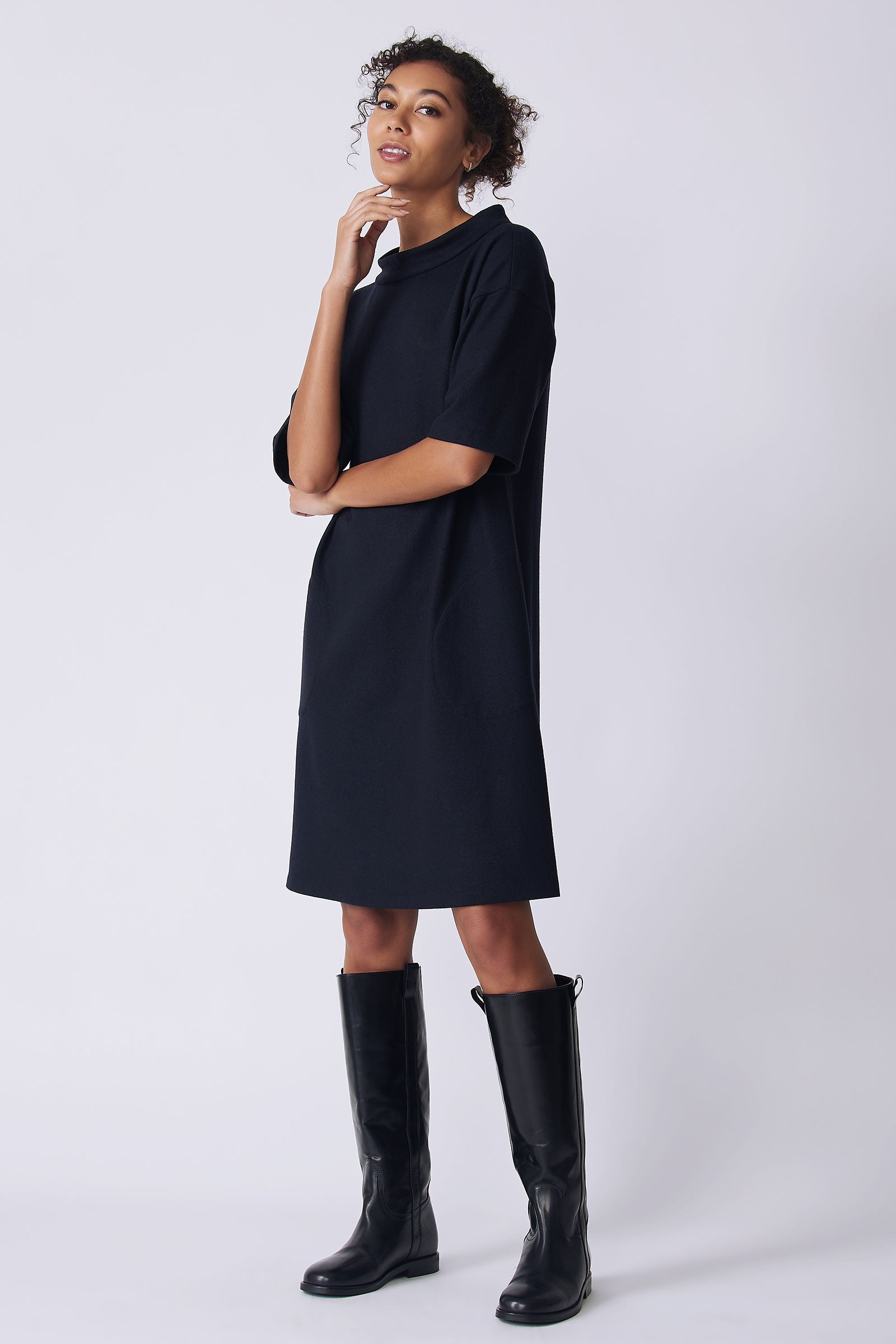 Kal Rieman Avery Dress in midnight felted jersey on model side view hand on chin