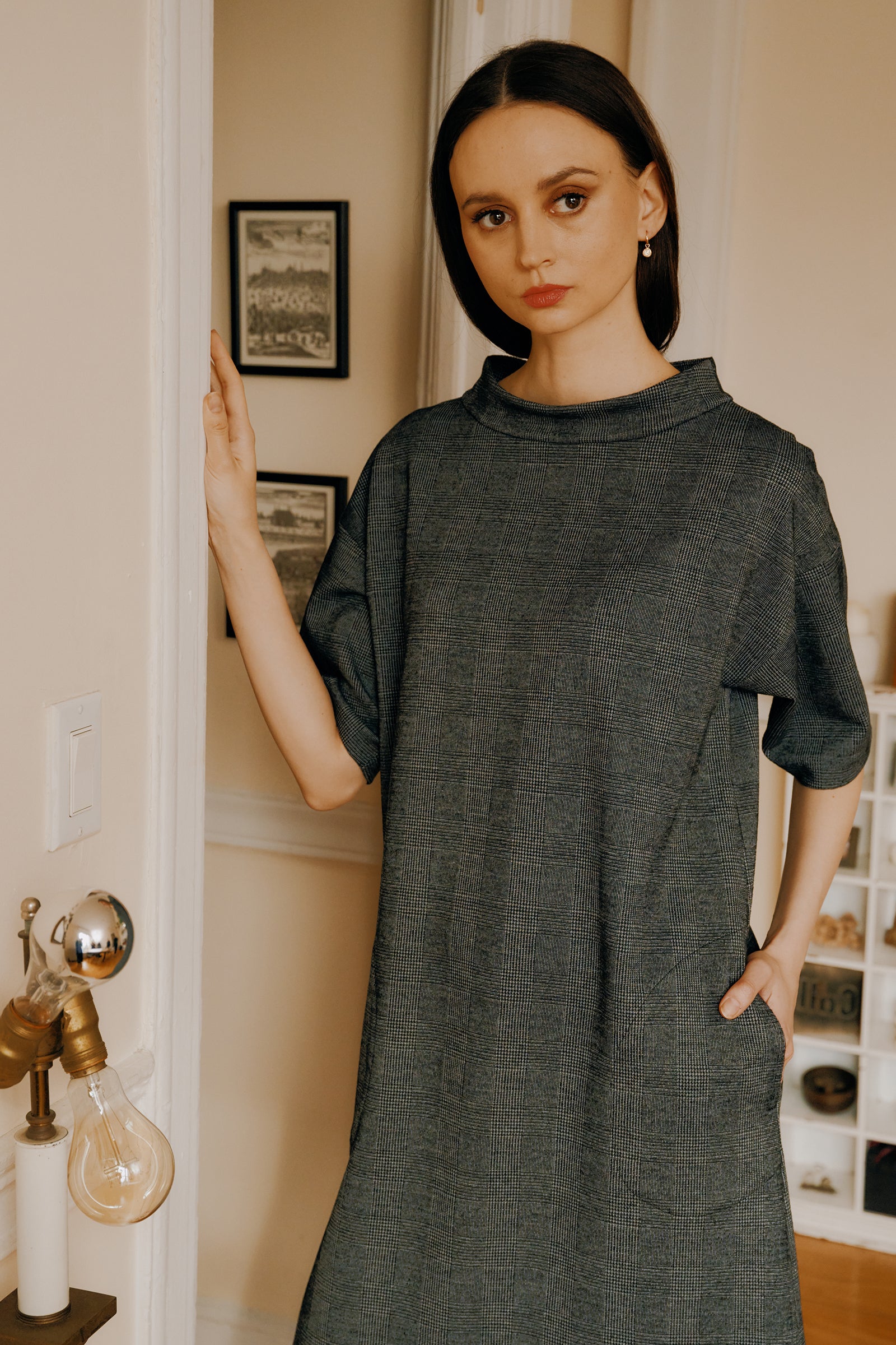 Kal Rieman Avery Shift Dress in black plaid on Model hand in pocket look book image