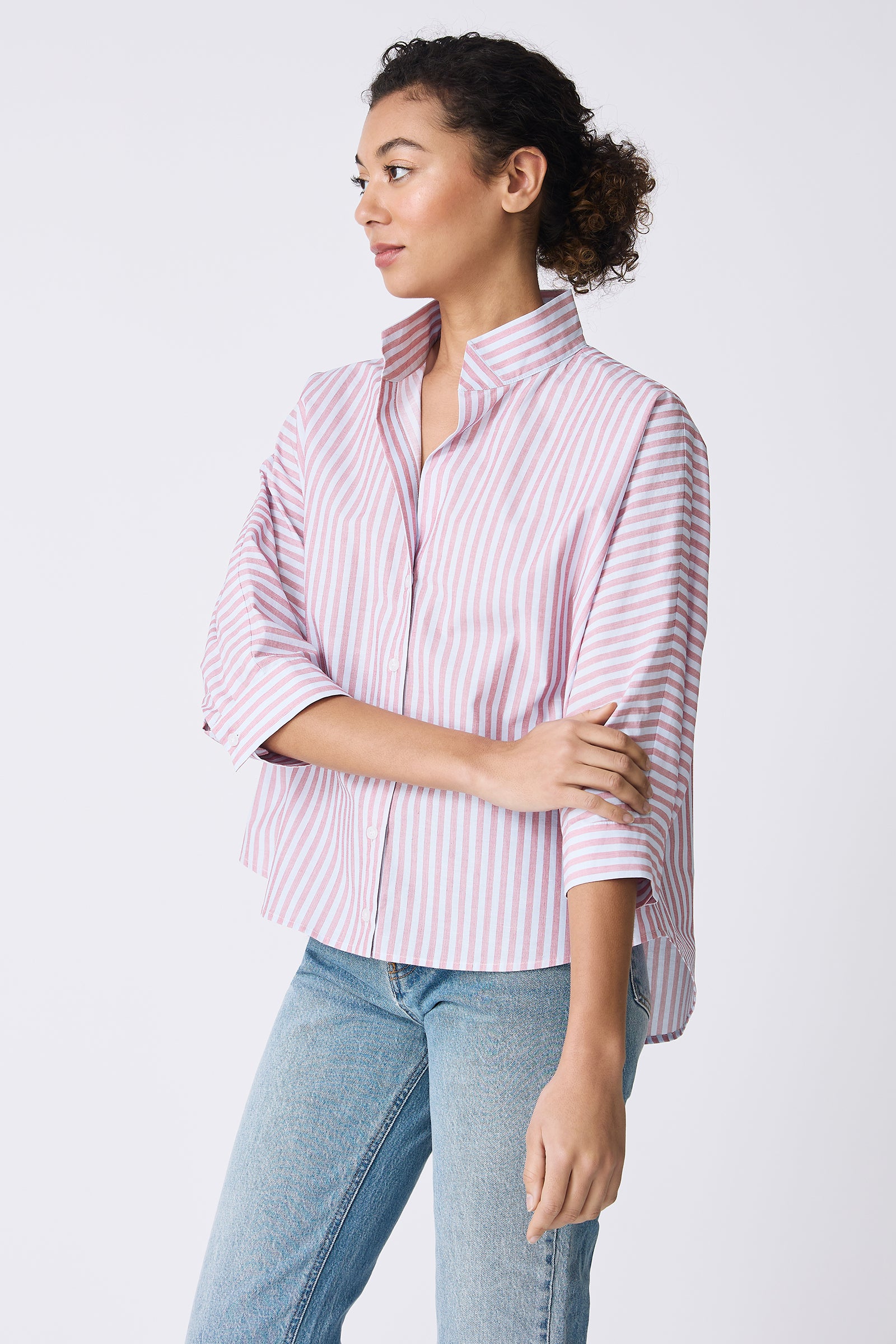 Kal Rieman Avi Shirt in Cabana Stripe Red on model touching arm side view