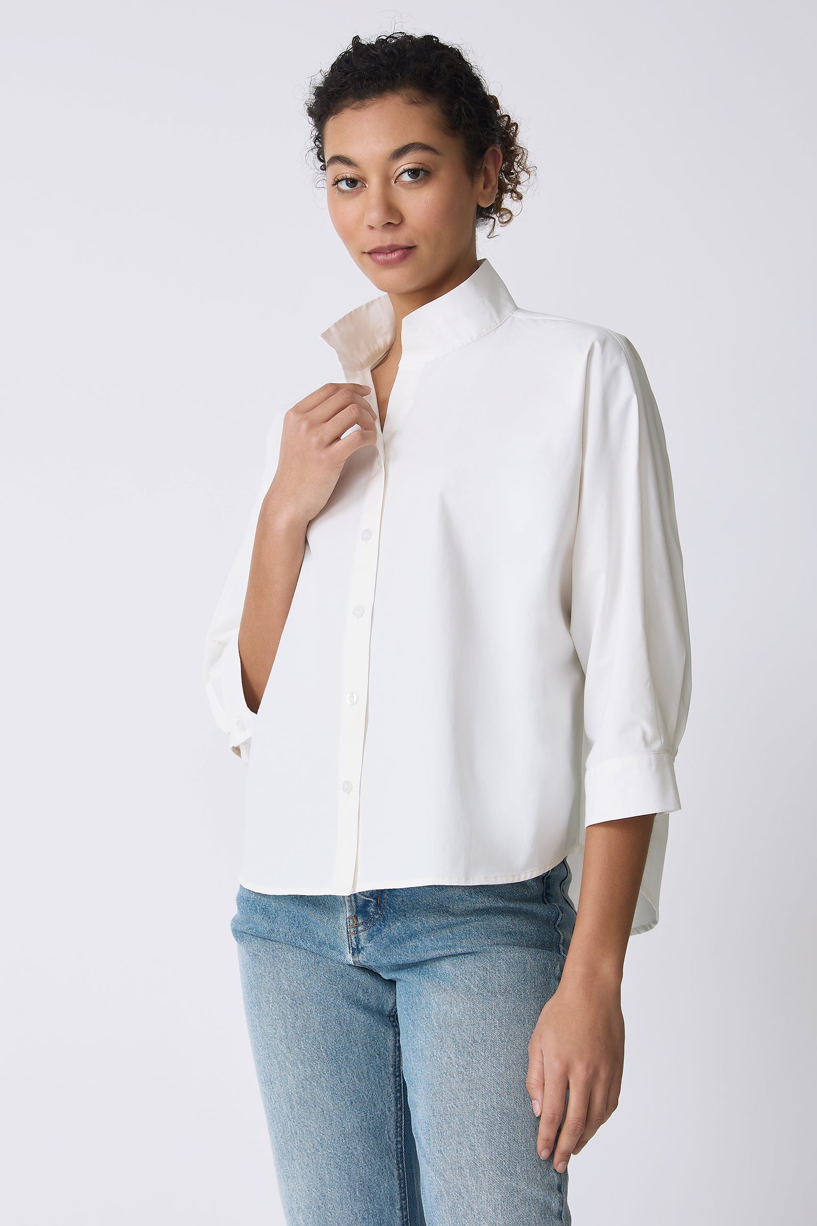 Kal Rieman Avi Shirt in Ecru on model touching collar front view