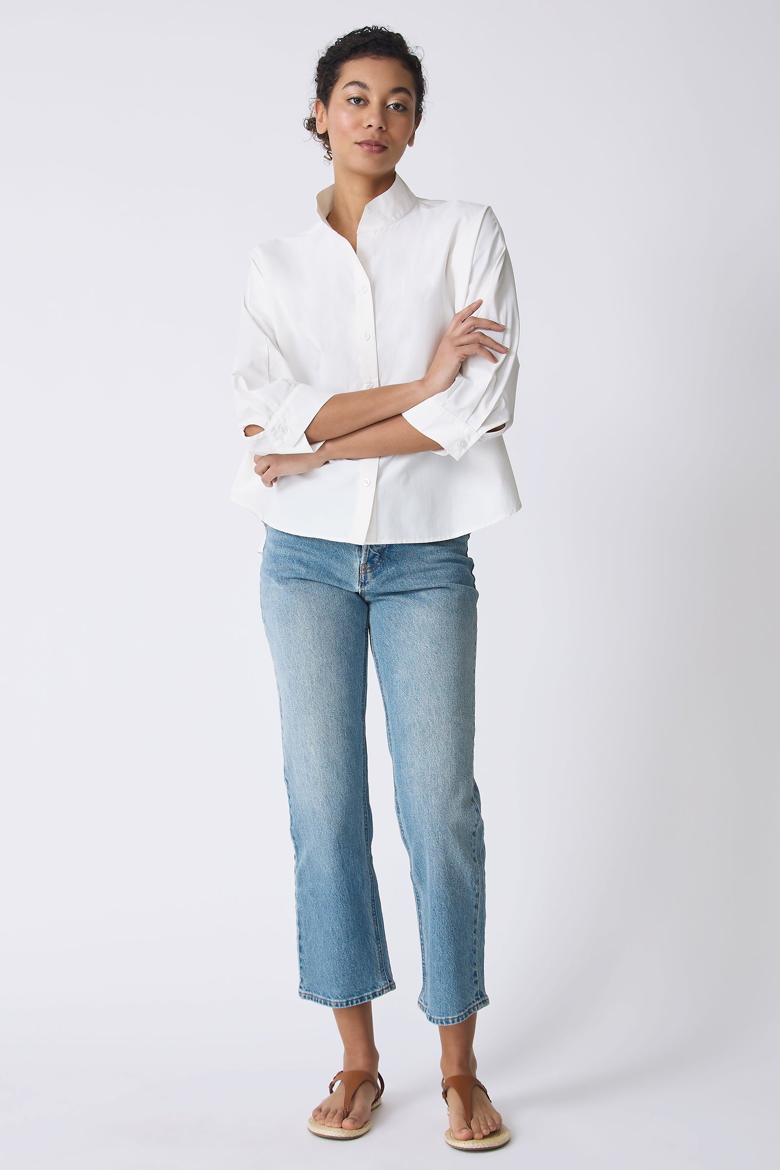 Kal Rieman Avi Shirt in Ecru on model with arms folded full front view