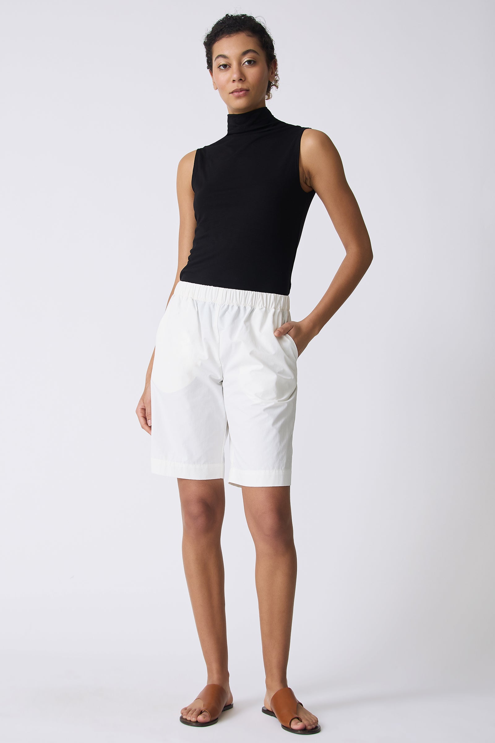 Kal Rieman Bahama Short in Ecru on model with hand in pocket full front view
