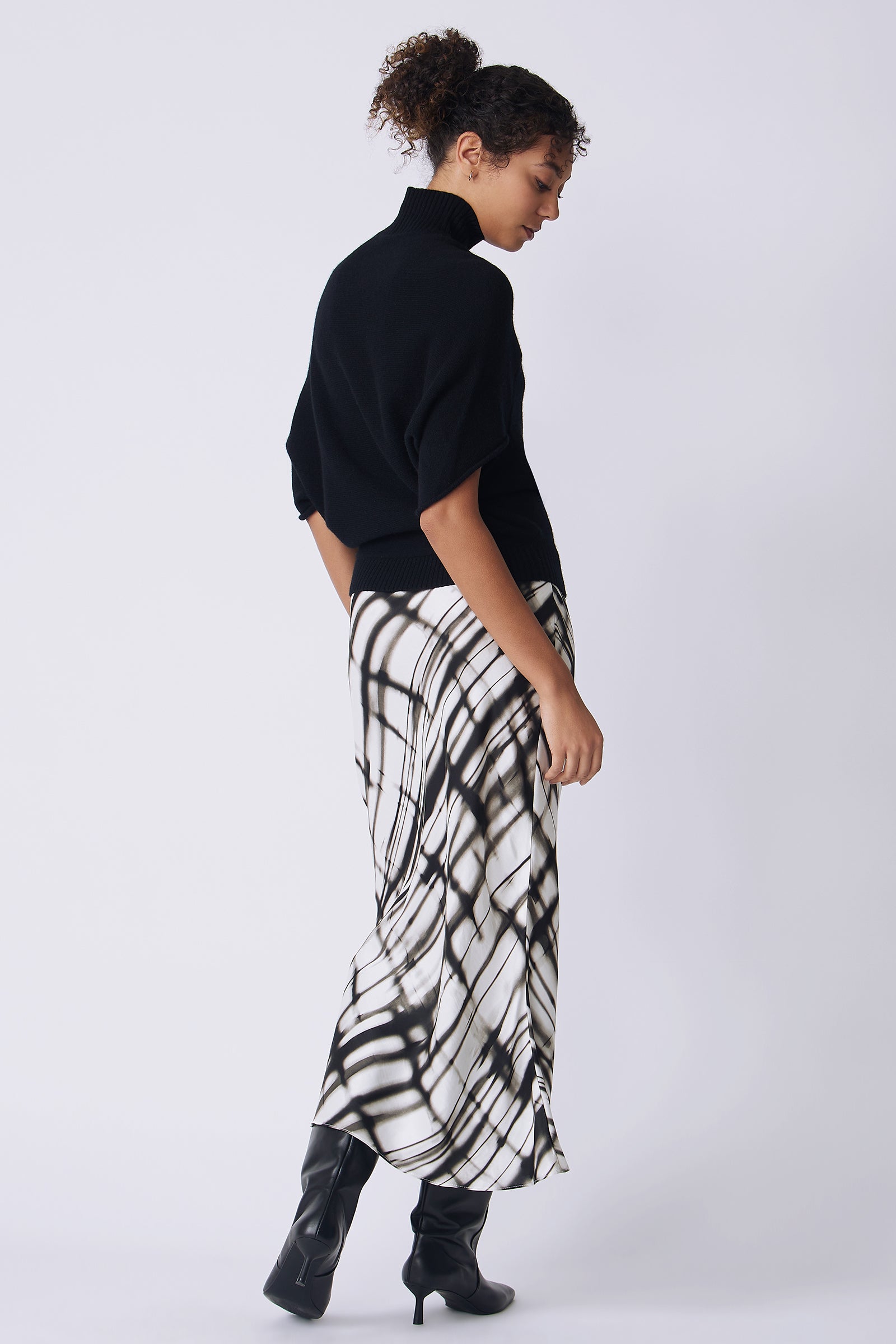 Kal Rieman Bias silk skirt in watercolor print on model back view