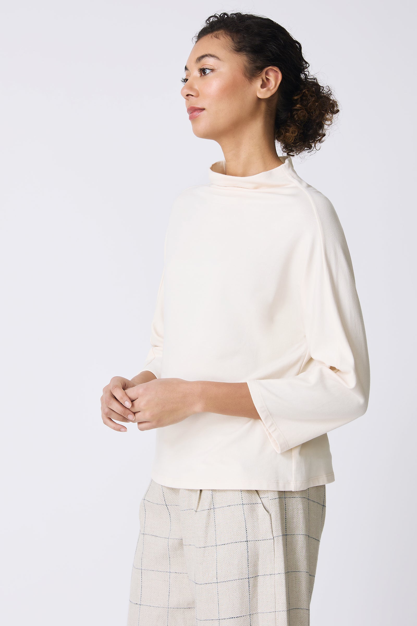 Kal Rieman Brigitte Mock Funnel Top in Ivory on model side view