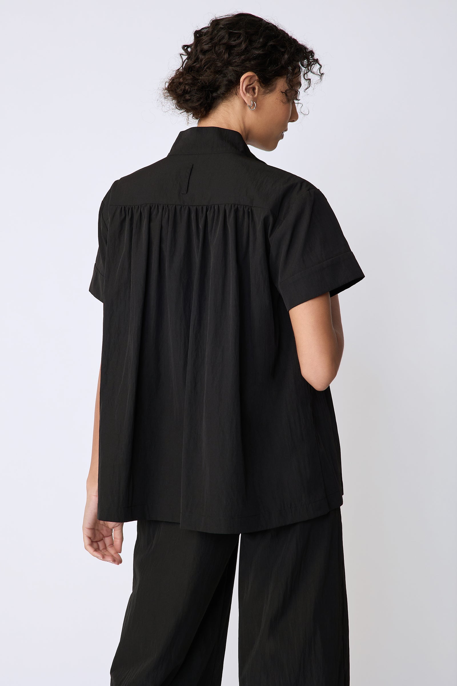 Kal Rieman Camille Top in black typewriter cloth on model back view