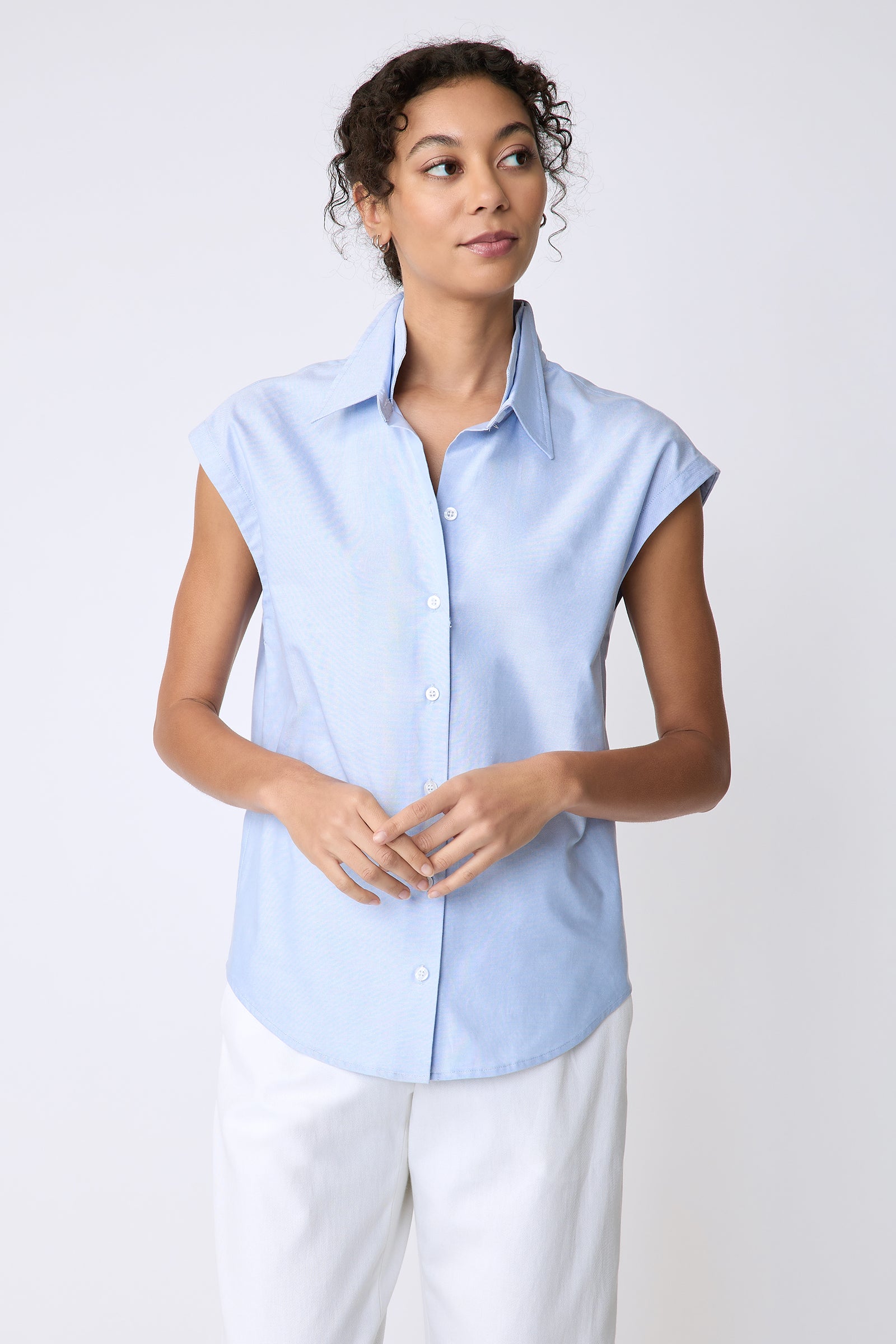 Kal Rieman Candice Cap Sleeve Double Collar Shirt in oxford blue on model front view hands in front