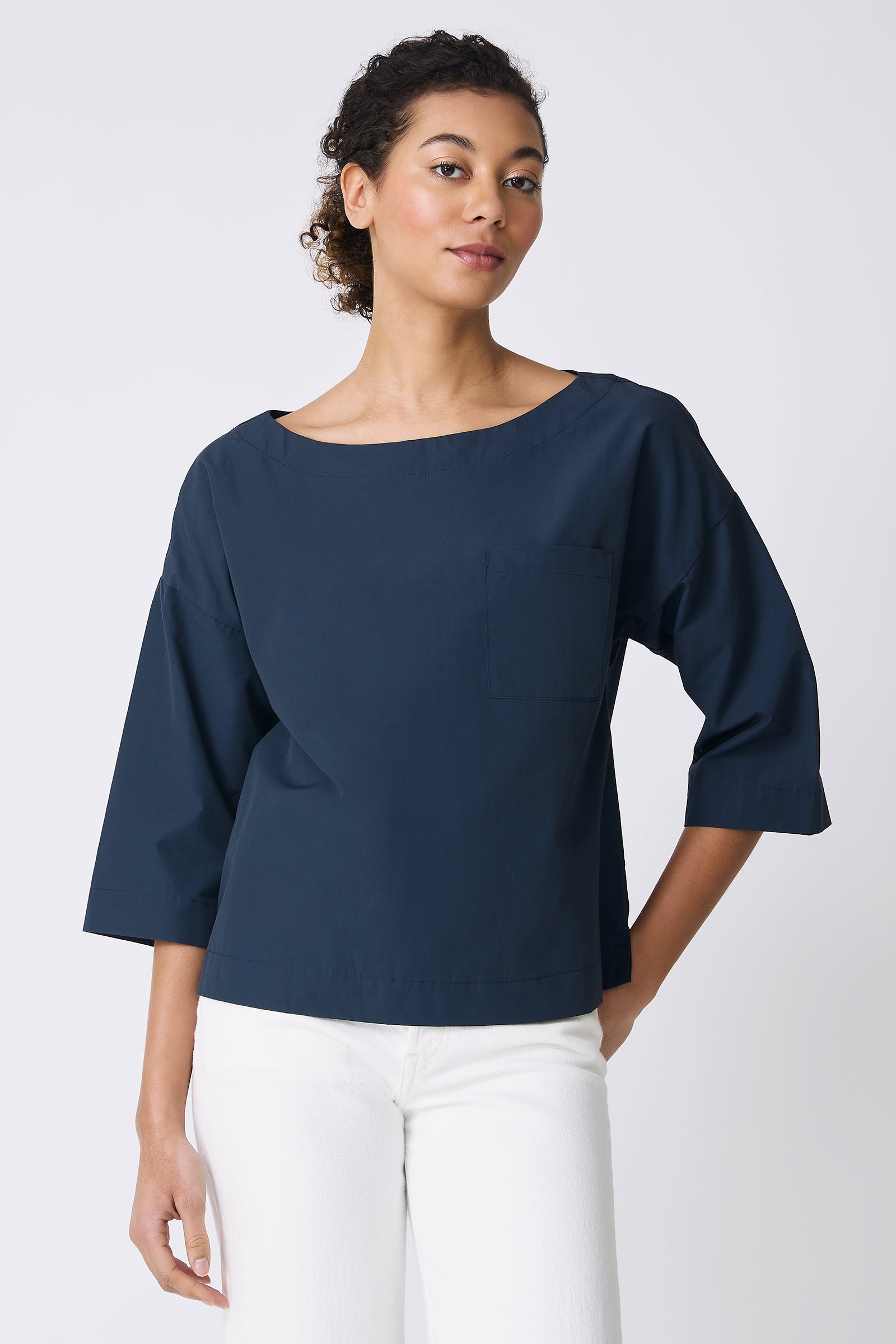 Kal Rieman Carmen Pocket Tee in Summer Navy on model with hand in back pocket front view
