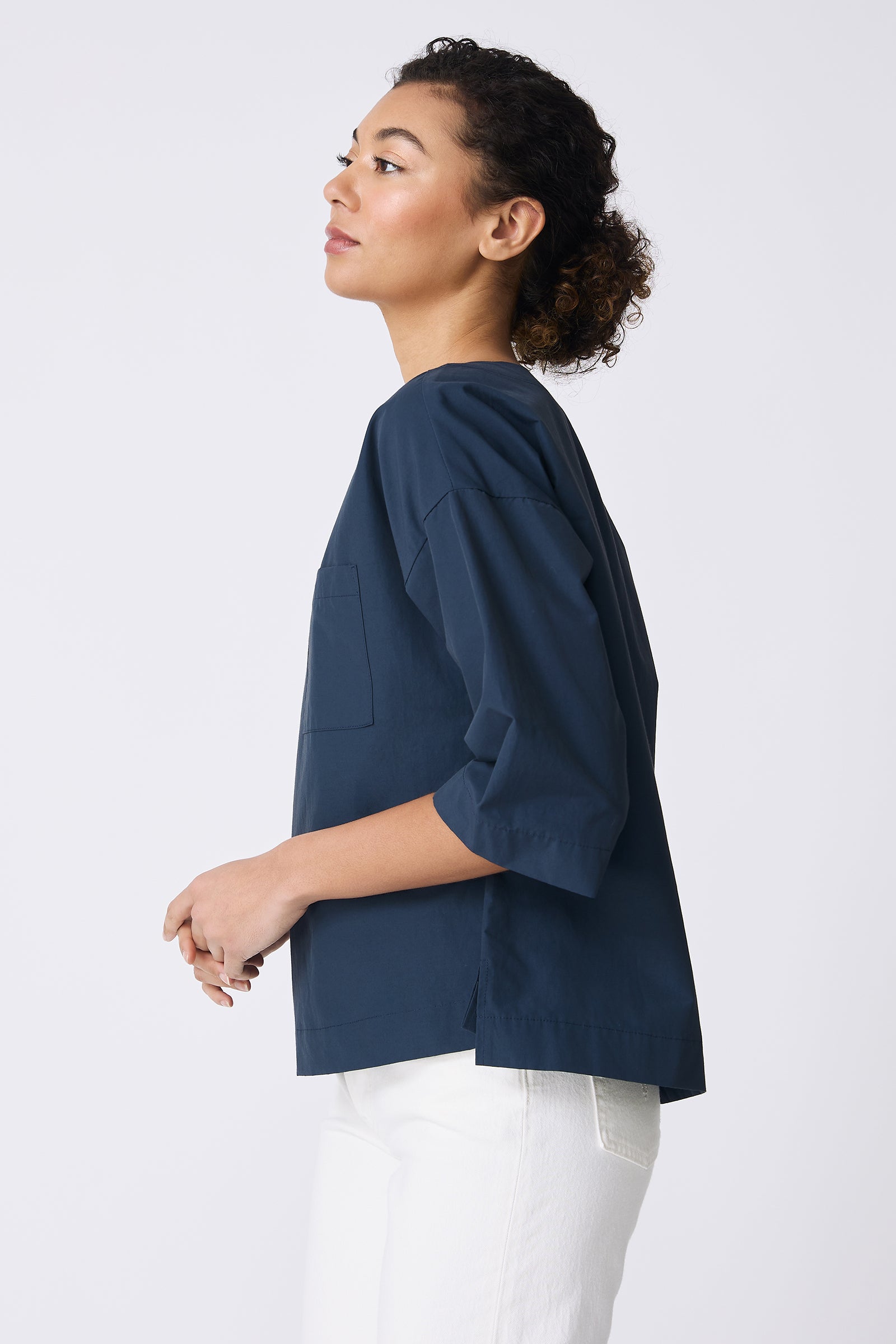 Kal Rieman Carmen Pocket Tee in Summer Navy on model side view