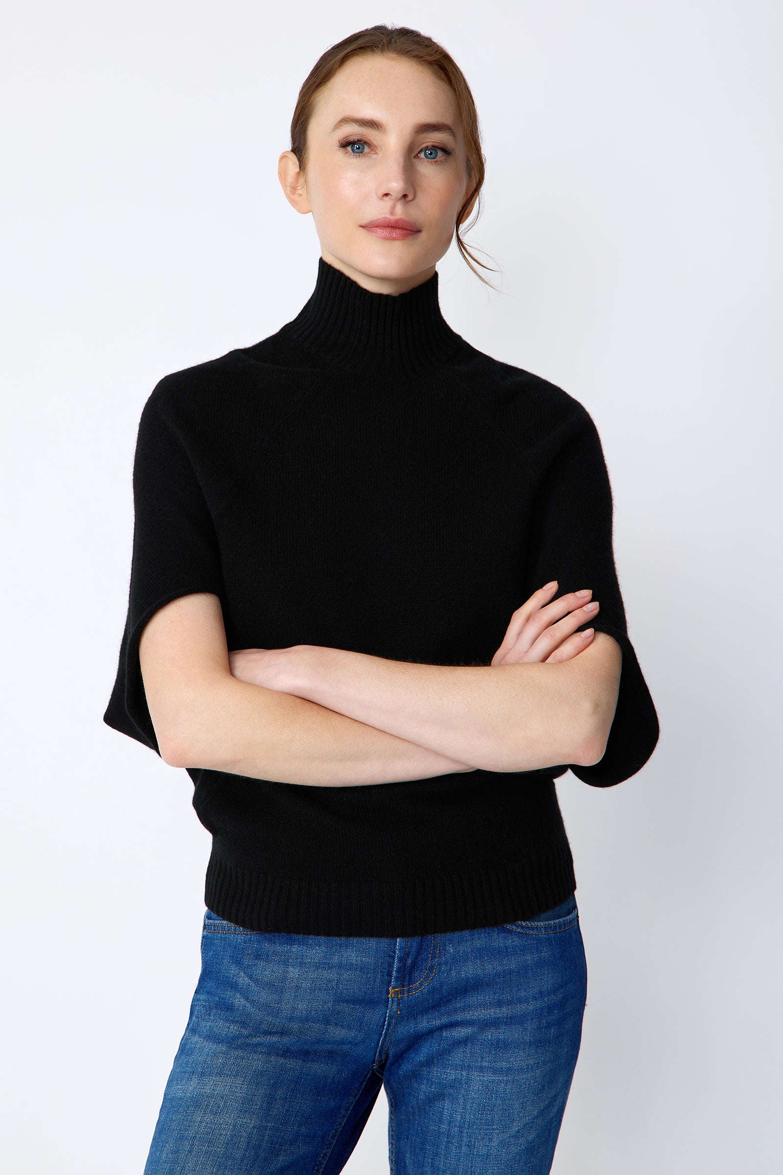 Kal Rieman Cashmere Cape Sweater in black on model front view arms crossed