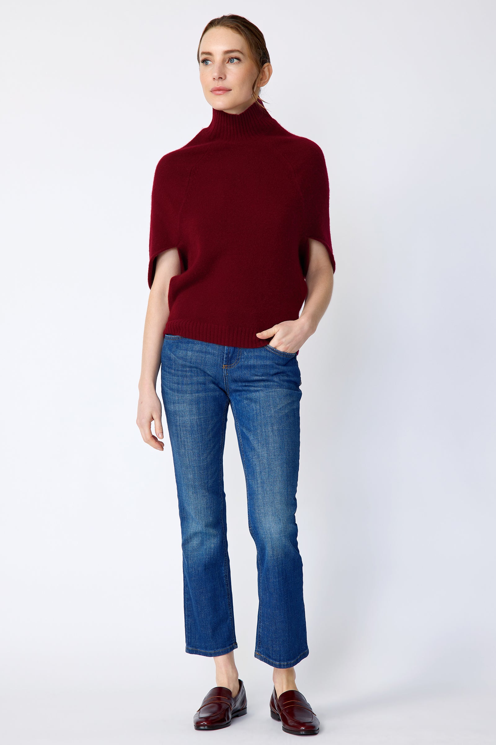Kal Rieman Cashmere Cape Sweater in bordeaux on model front view full length hand in pocket