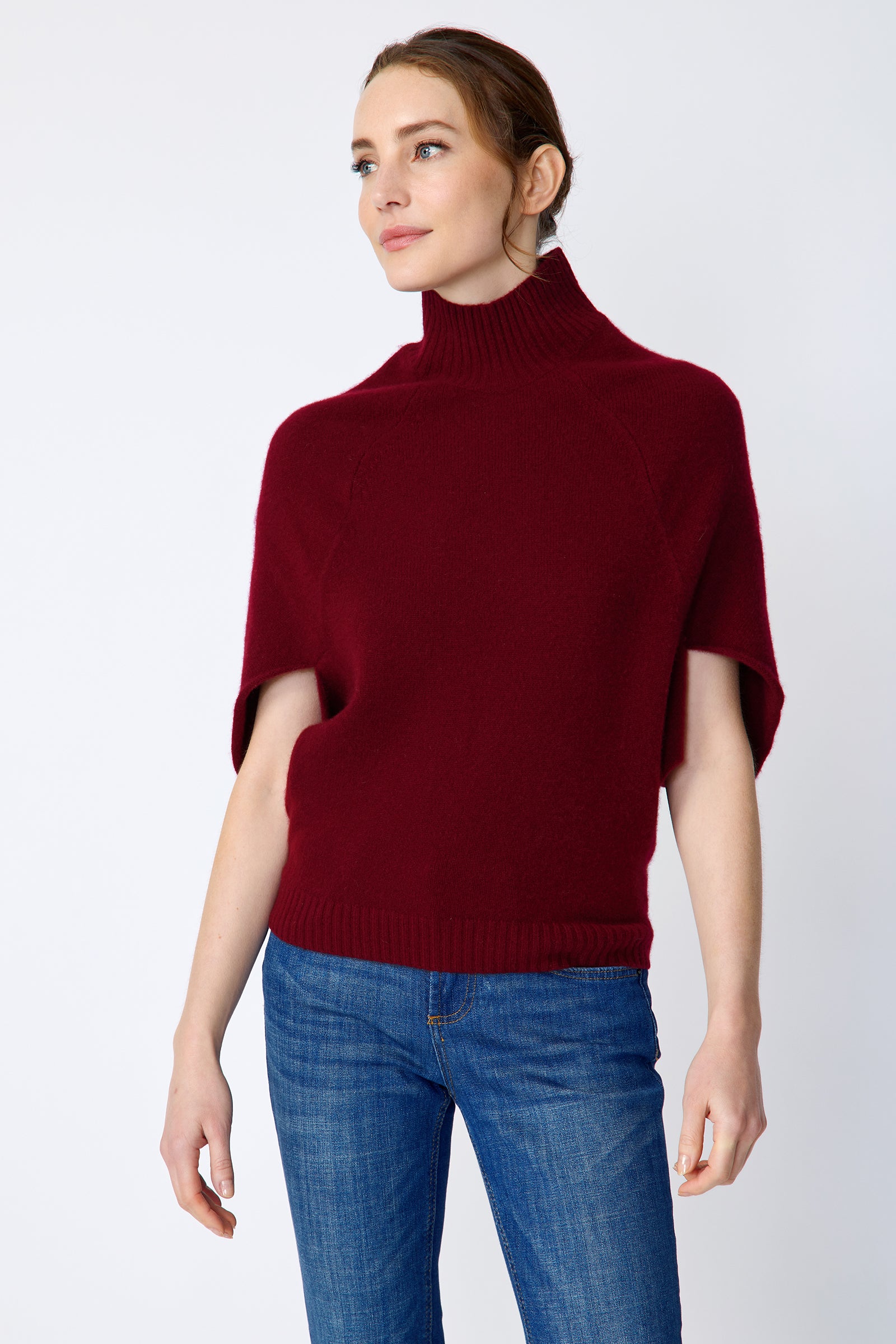 Kal Rieman Cashmere Cape Sweater in bordeaux on model side view arms at side