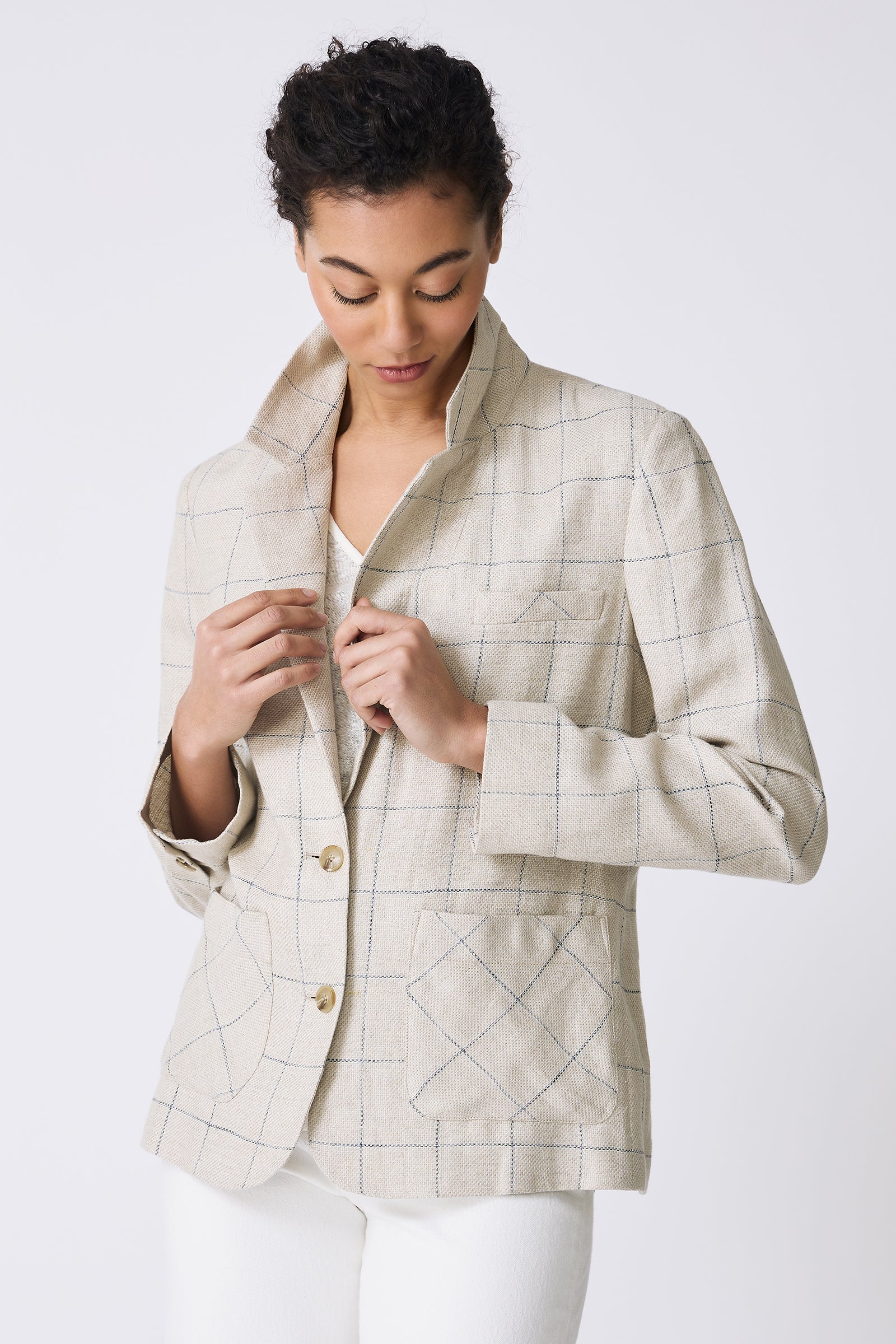 Kal Rieman Castel Patch Pocket Blazer in Windowpane on model touching lapels front view