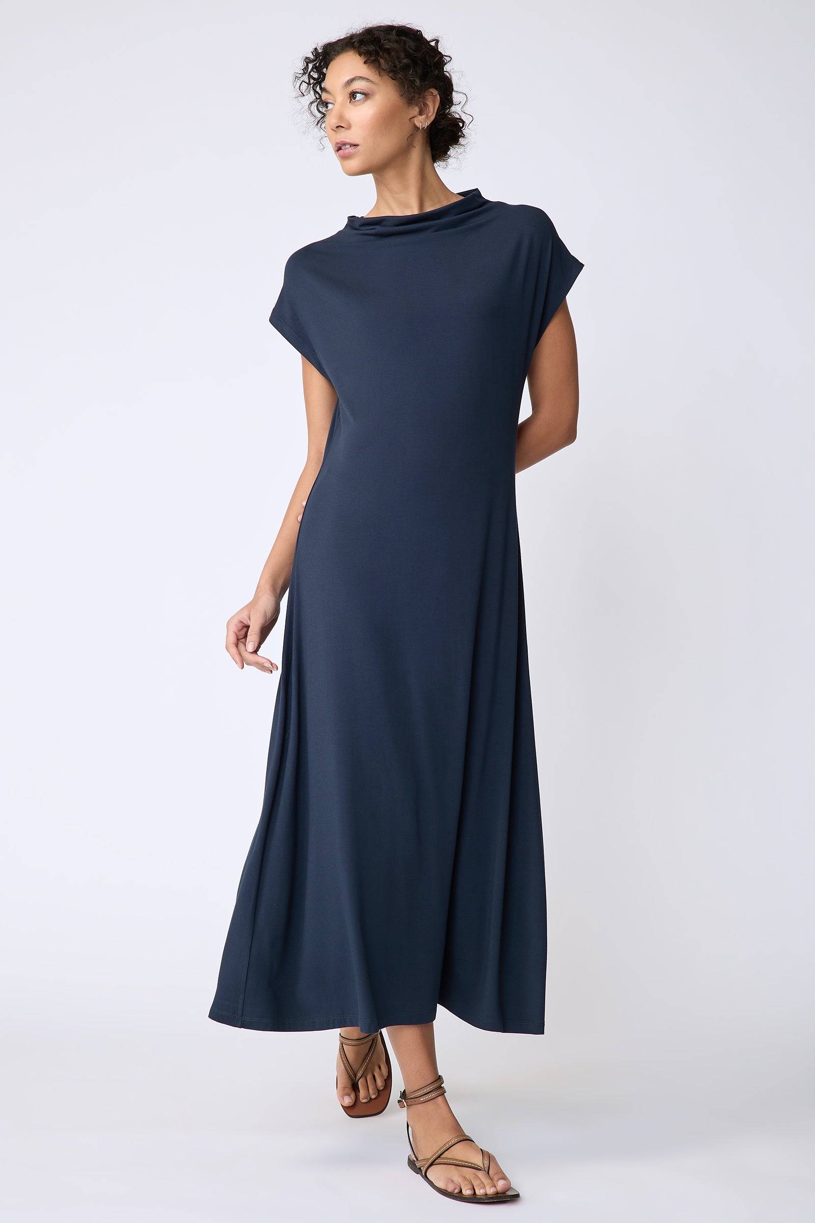 Kal Rieman Christie Knit dress in navy bamboo jersey on model front view walking