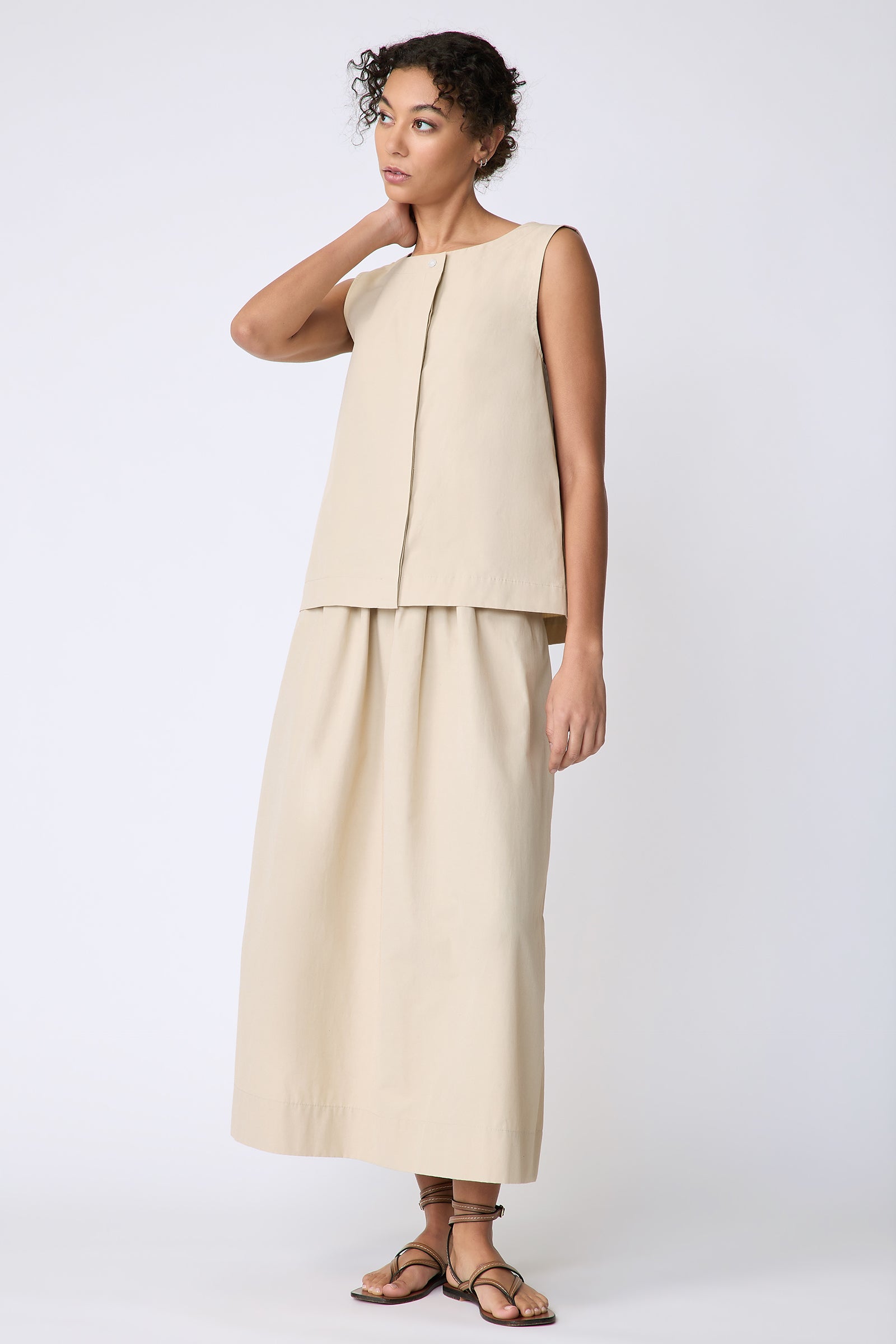 Kal Rieman Colette Shell in Italian Broadcloth sand on model side view full look hand on neck