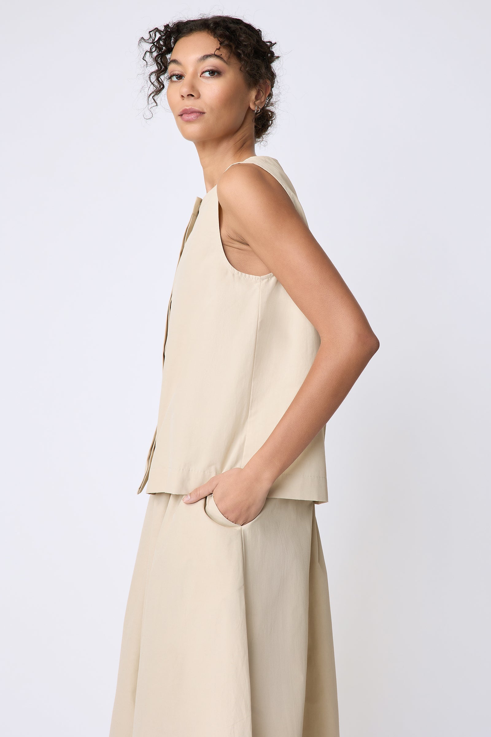 Kal Rieman Colette Shell in Italian Broadcloth sand on model side view hands in pockets
