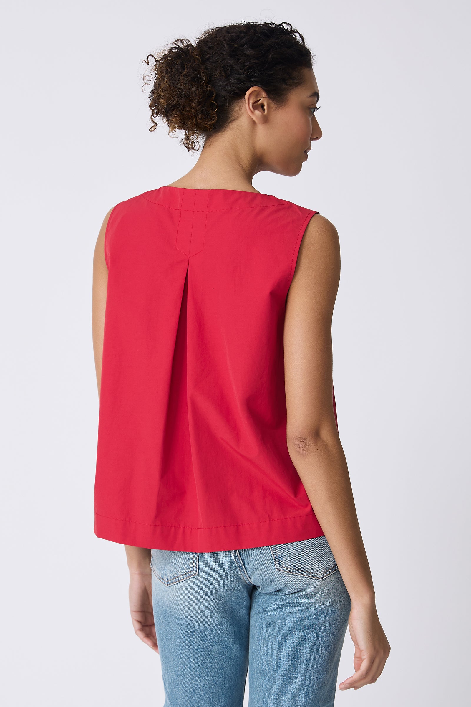 Kal Rieman Colette Shell Top in Red on model with arm behind back front view