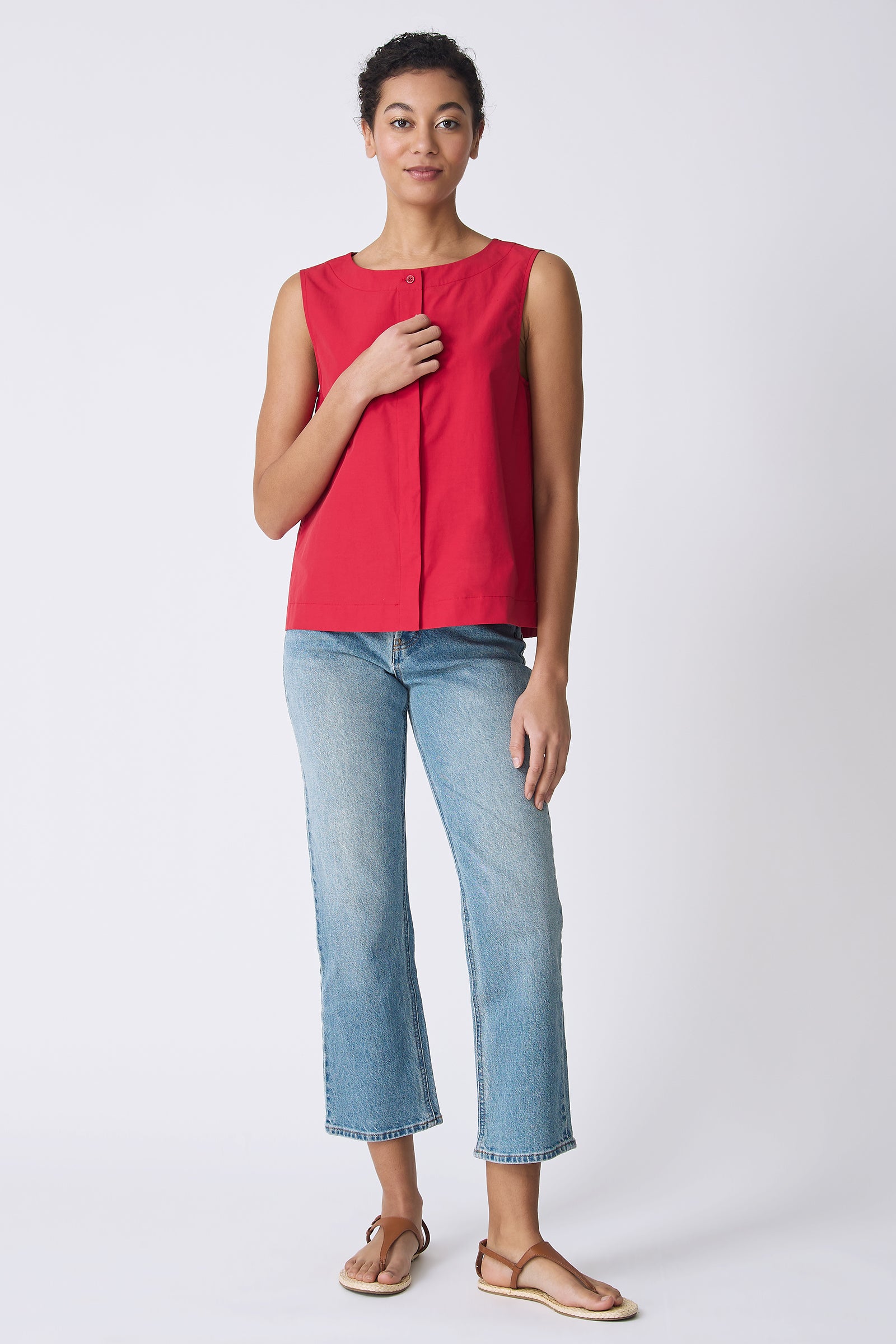 Kal Rieman Colette Shell Top in Red on model touching button full front view