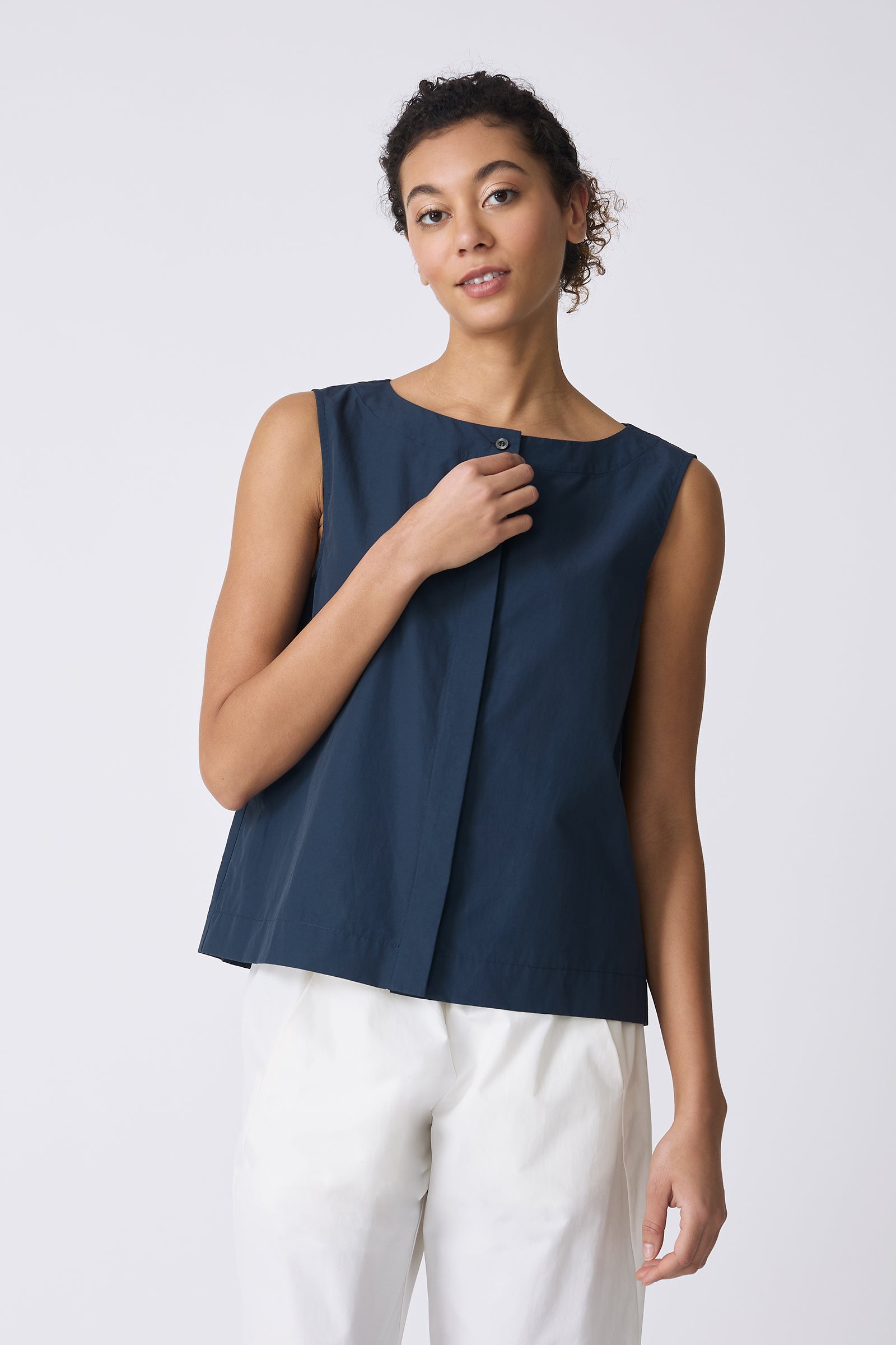 Kal Rieman Colette Shell in Summer Navy on model touching button front view