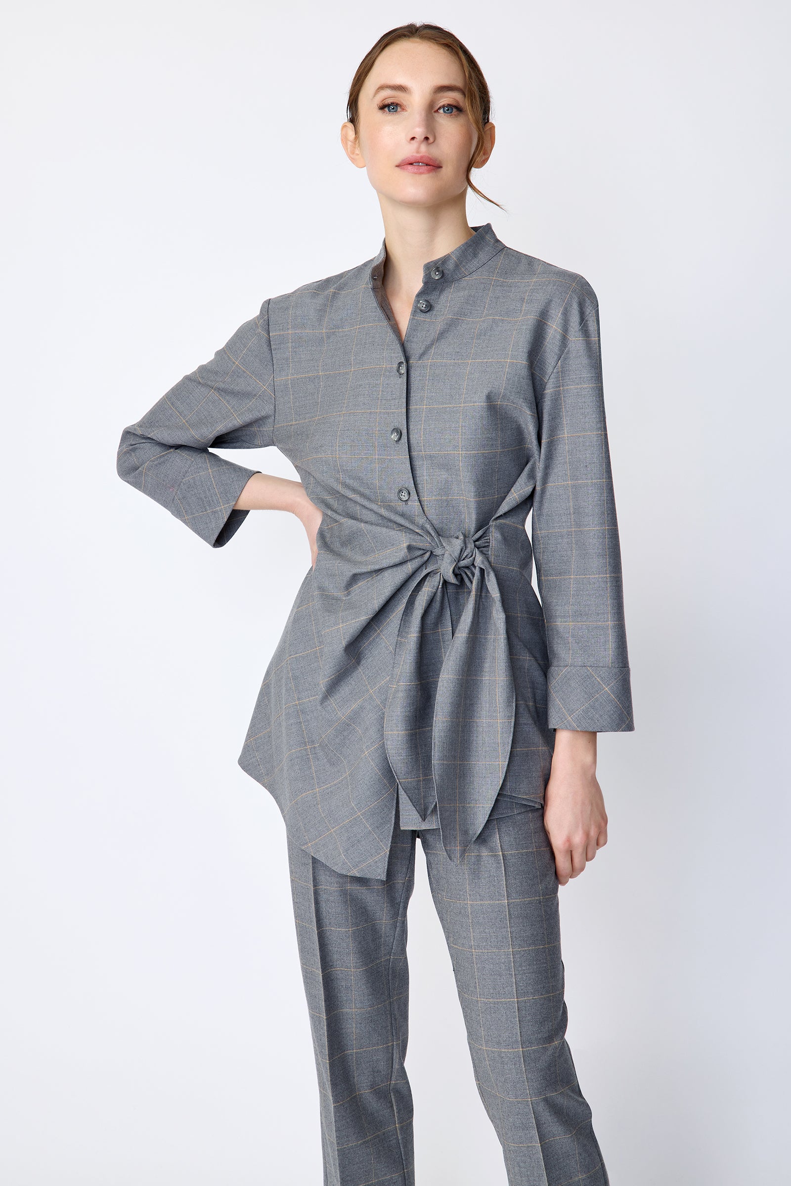 Kal Rieman Cynthia Wrap Top in Italian windowpane on model front view hand on hip