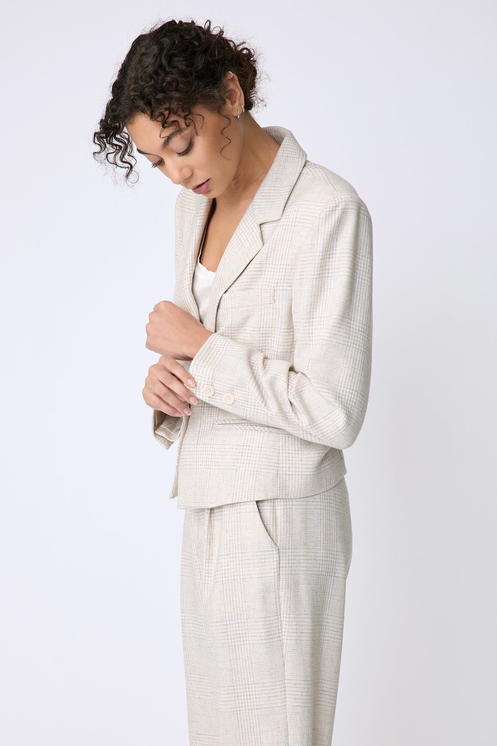 Kal Rieman Dakota Blazer in Italian Summer Plaid on model side view holding cuff