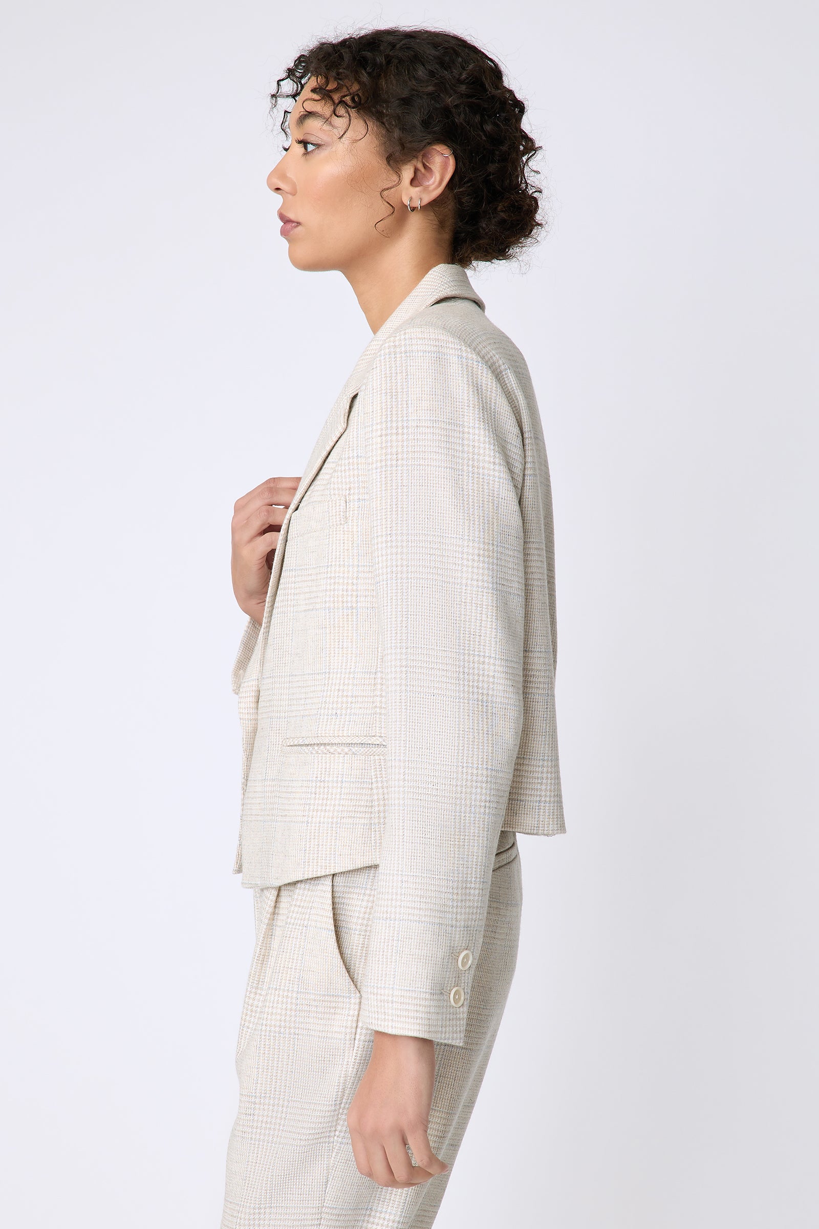 Kal Rieman Dakota Blazer in Italian Summer Plaid on model side view holding lapel