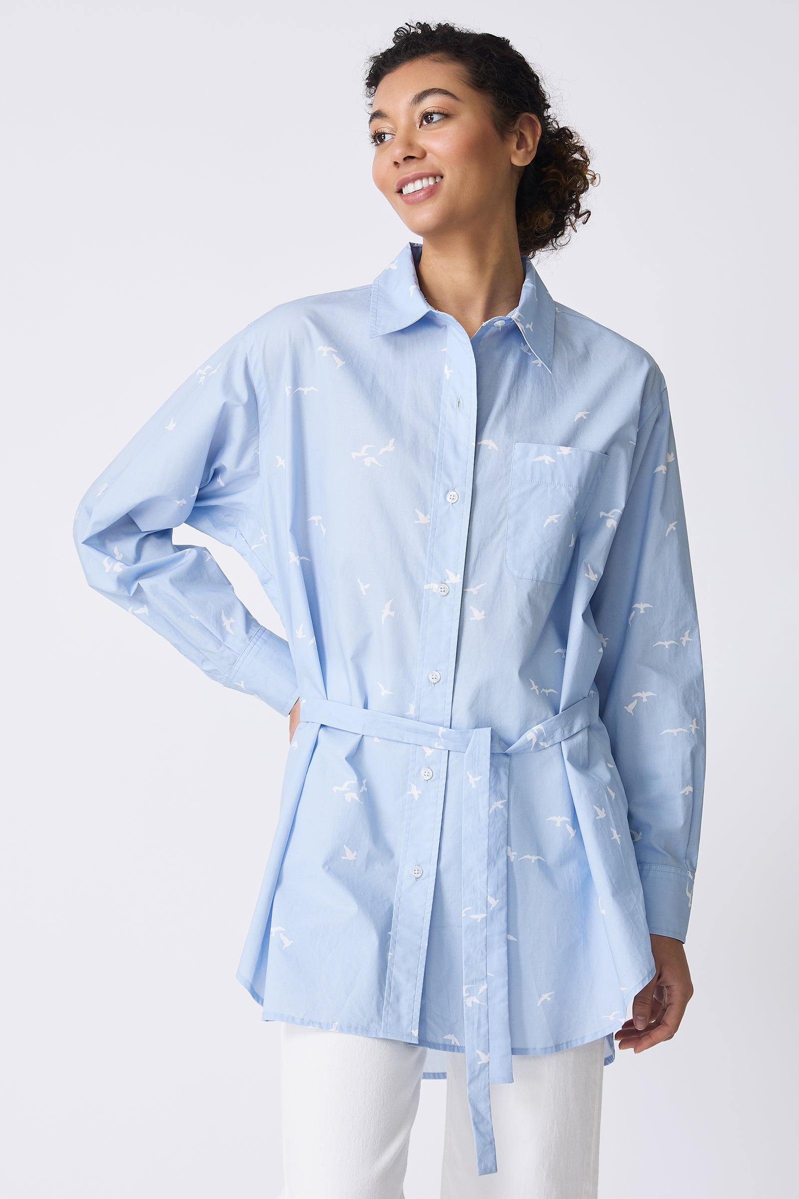 Kal Rieman Deanna Shirt in Oxford Blue Bird Print on model with hand on hip front view