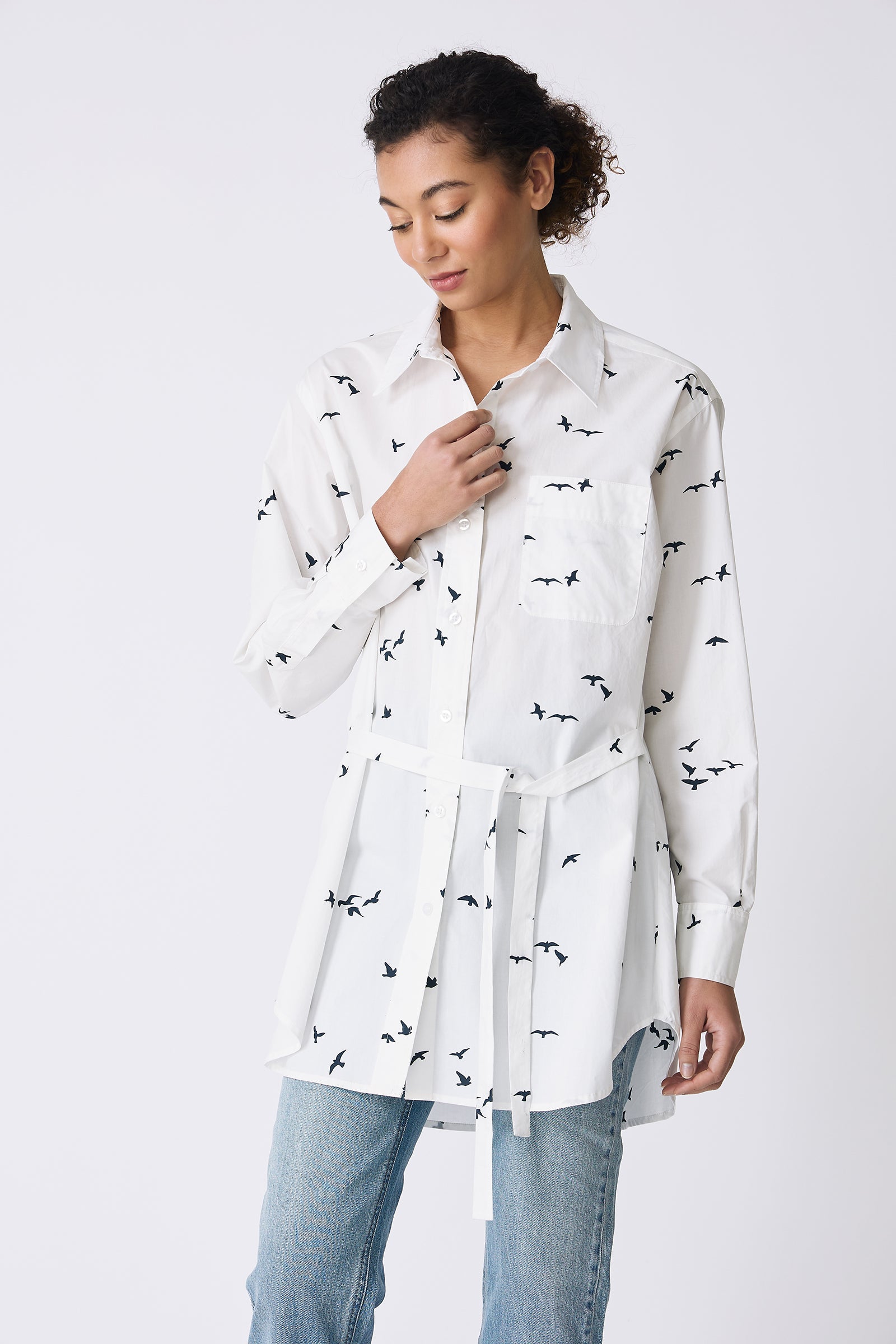 Kal Rieman Deanna Shirt in White Bird Print on model looking down front view