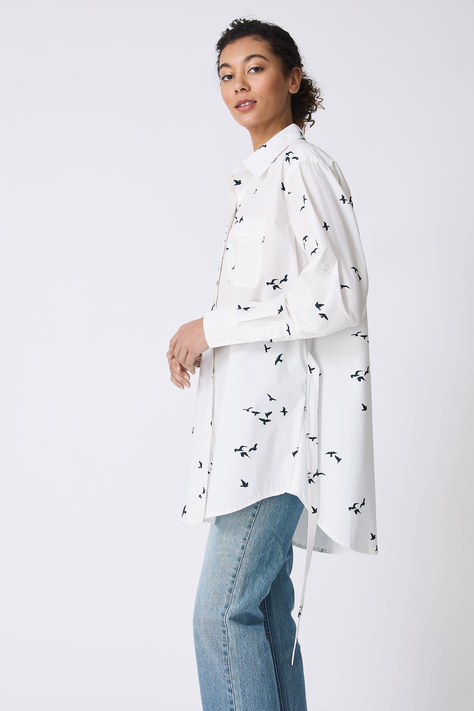 Kal Rieman Deanna Shirt in White Bird Print on model side view