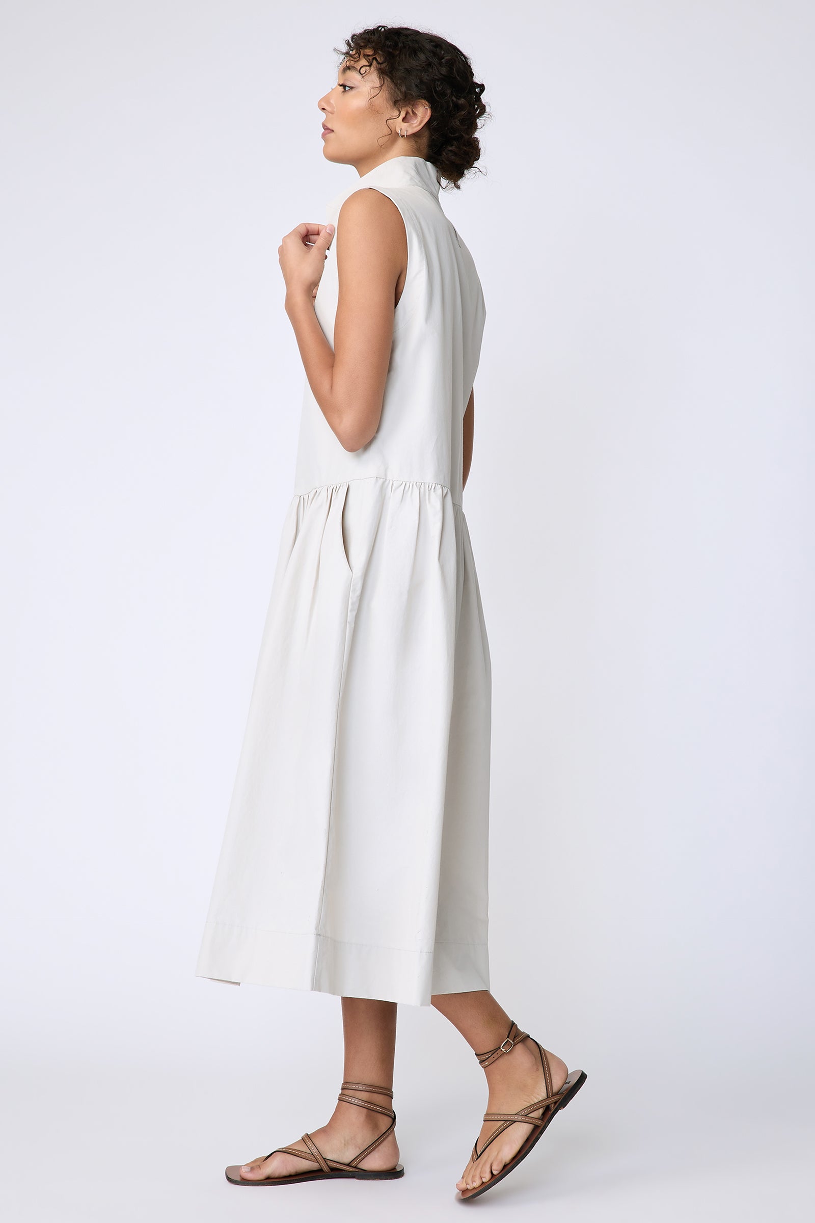 Kal Rieman Demi Dress in Italian Broadcloth stone color on model side view walking