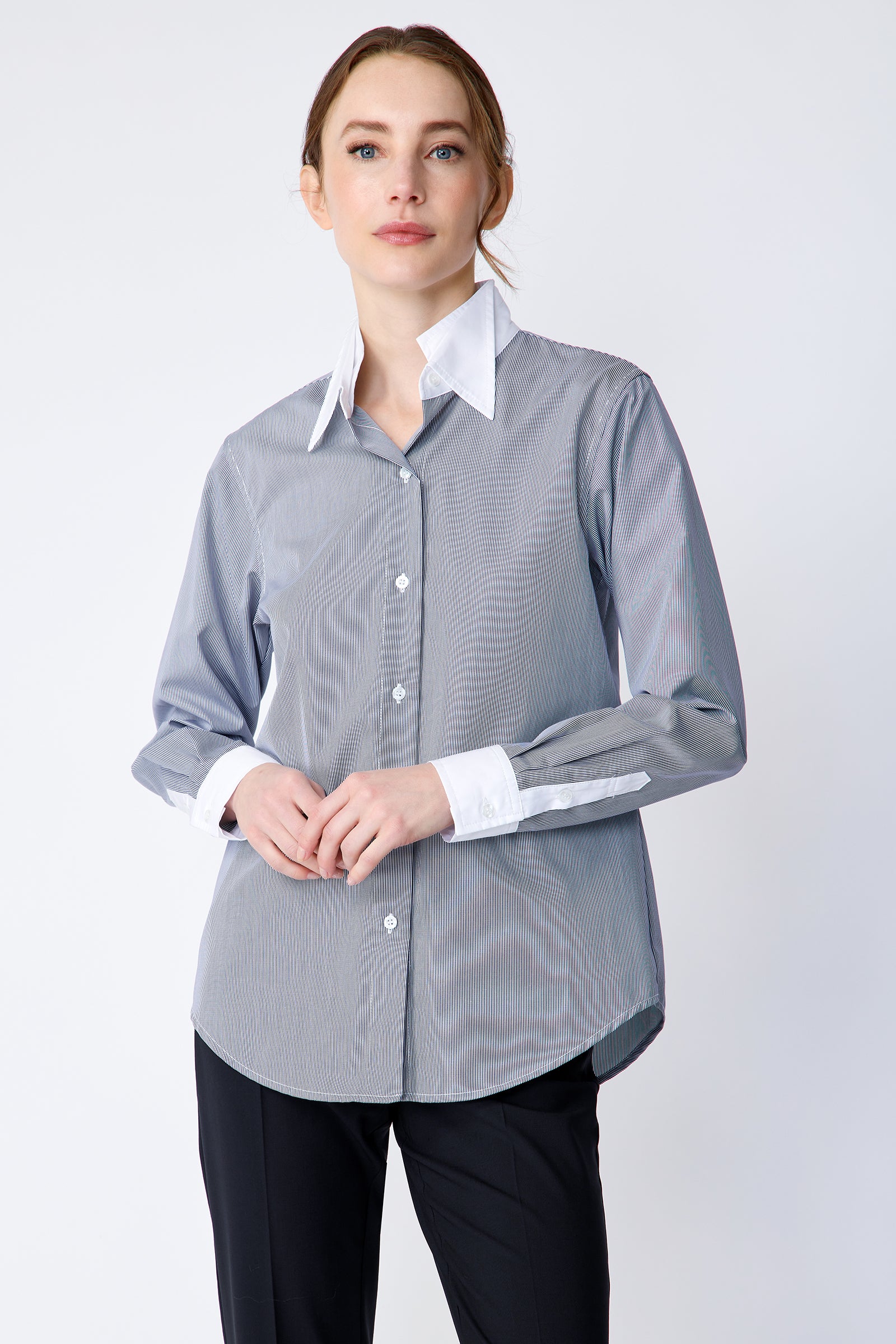 Kal Rieman Double Collar Shirt in Mini Stripe with white collar and cuffs on model front view detail hands in front