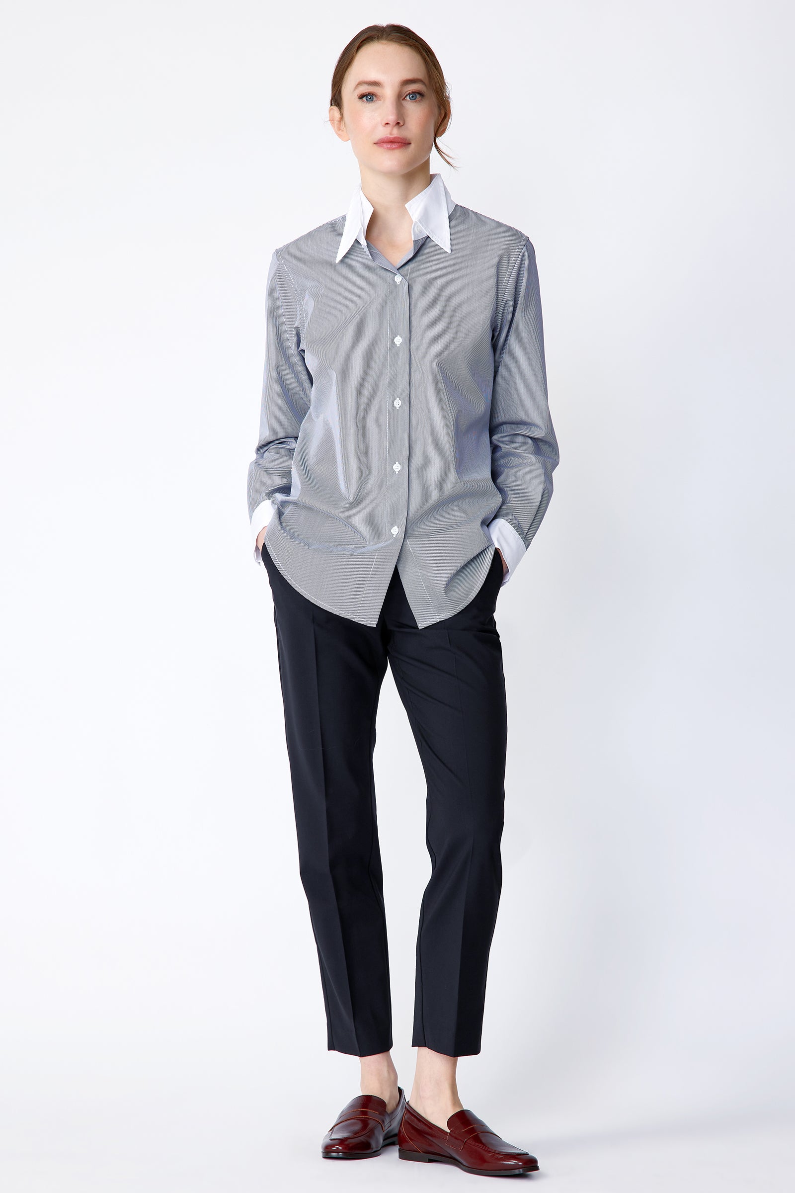 Kal Rieman Double Collar Shirt in Mini Stripe with white collar and cuffs on model front view full hands in pockets