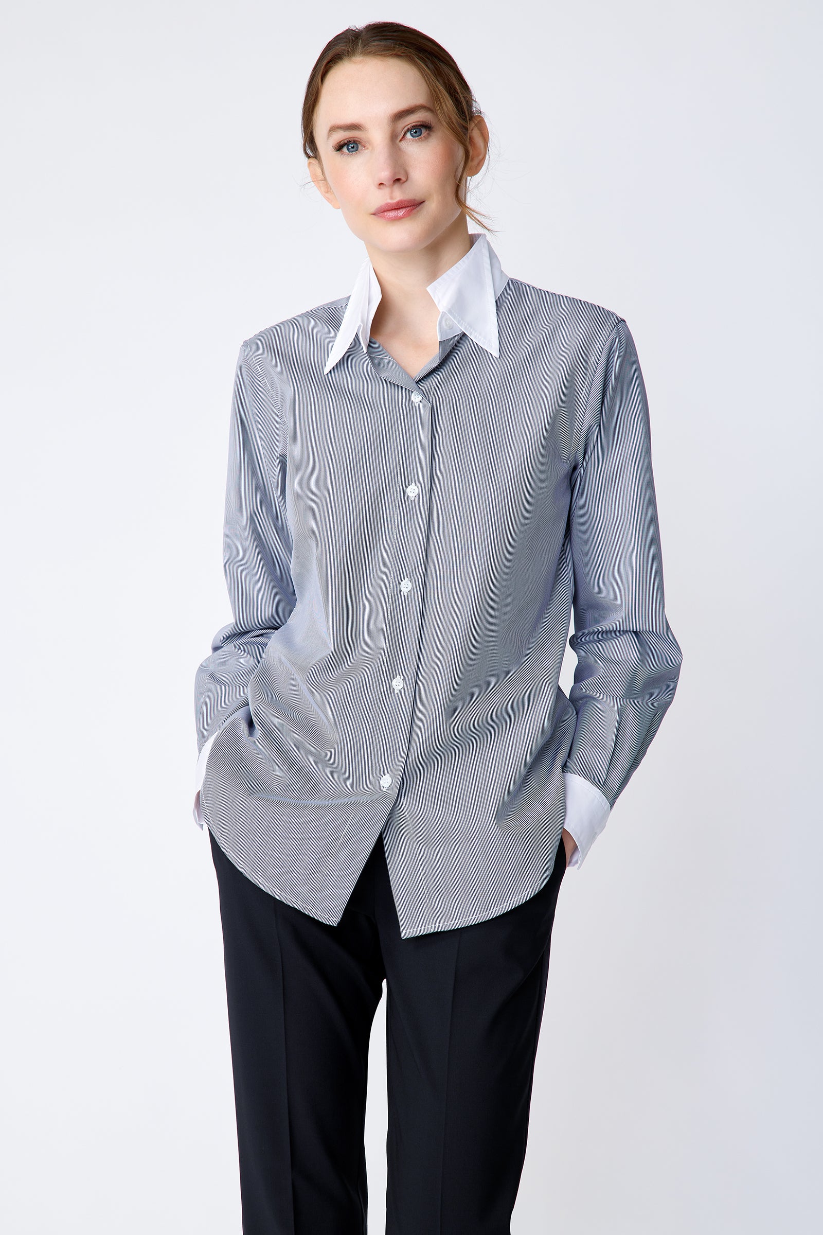 Kal Rieman Double Collar Shirt in Mini Stripe with white collar and cuffs on model front view hands in pockets