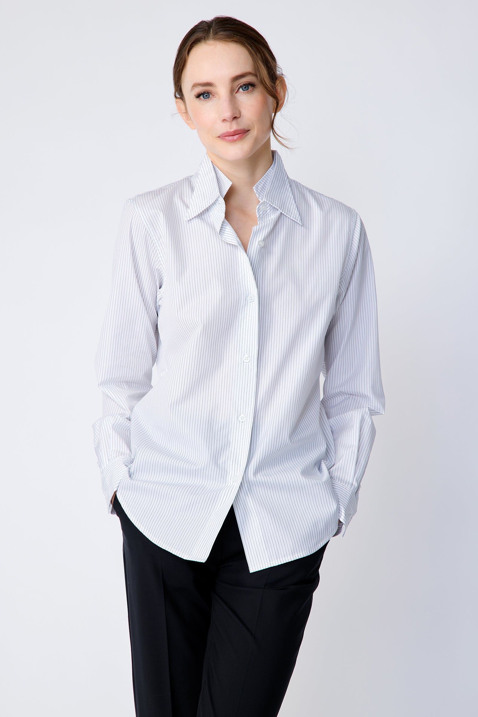 Kal Rieman Double Collar Shirt in pinstripe cotton on model front hands in pocket