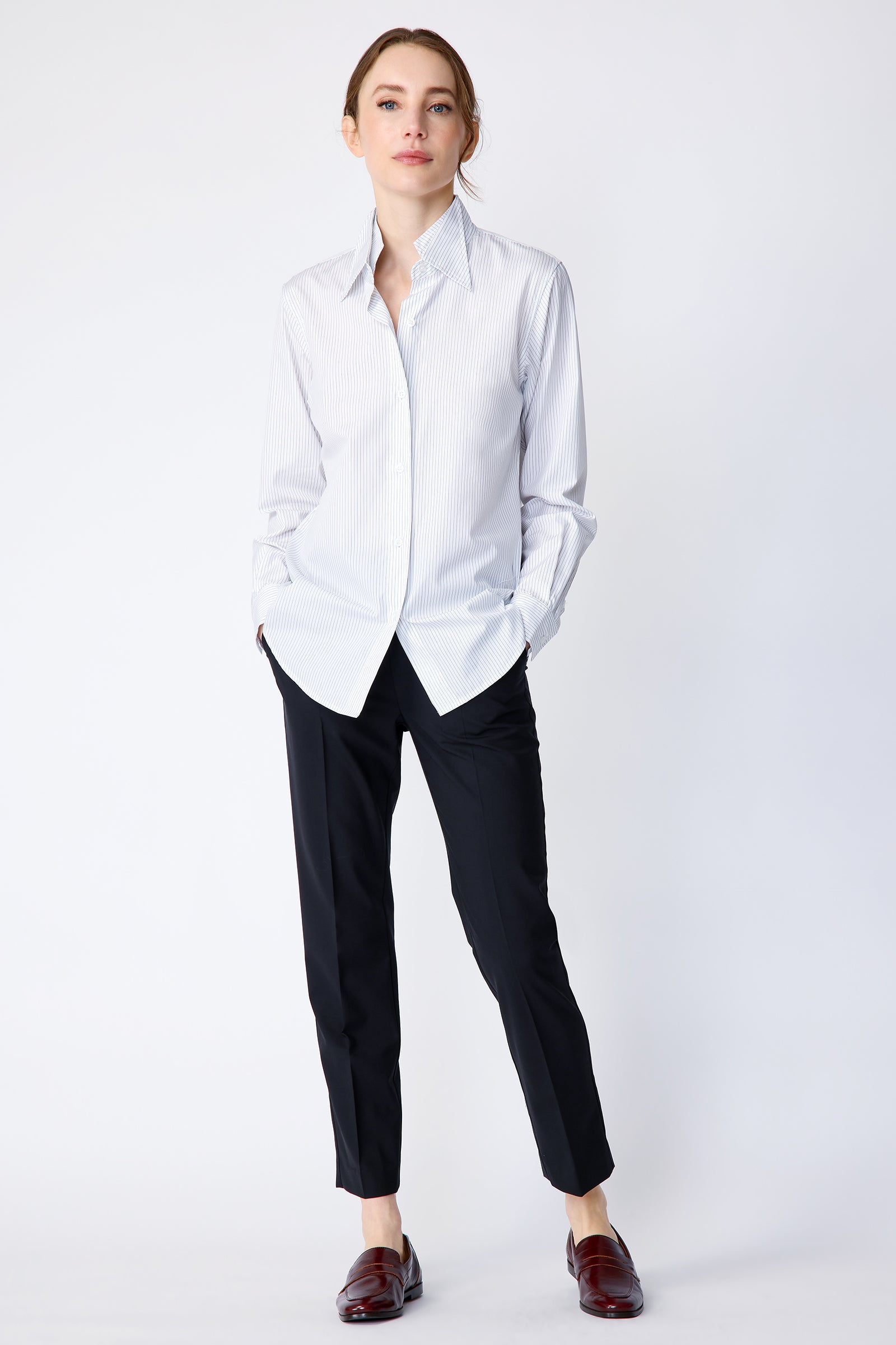 Kal Rieman Double Collar Shirt in pinstripe cotton on model front view full hands in pockets