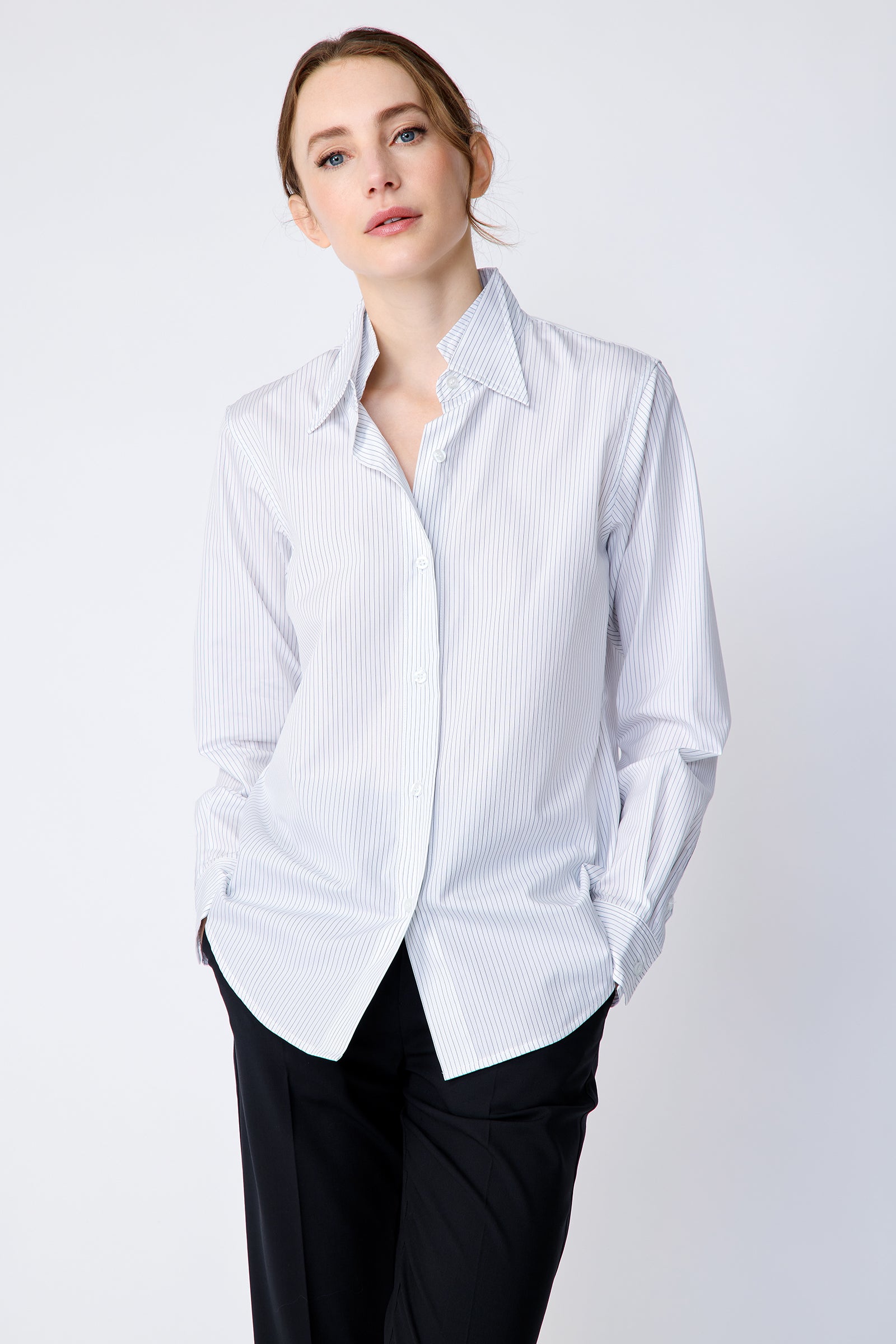 Kal Rieman Double Collar Shirt in pinstripe cotton on model front view hands in pocket
