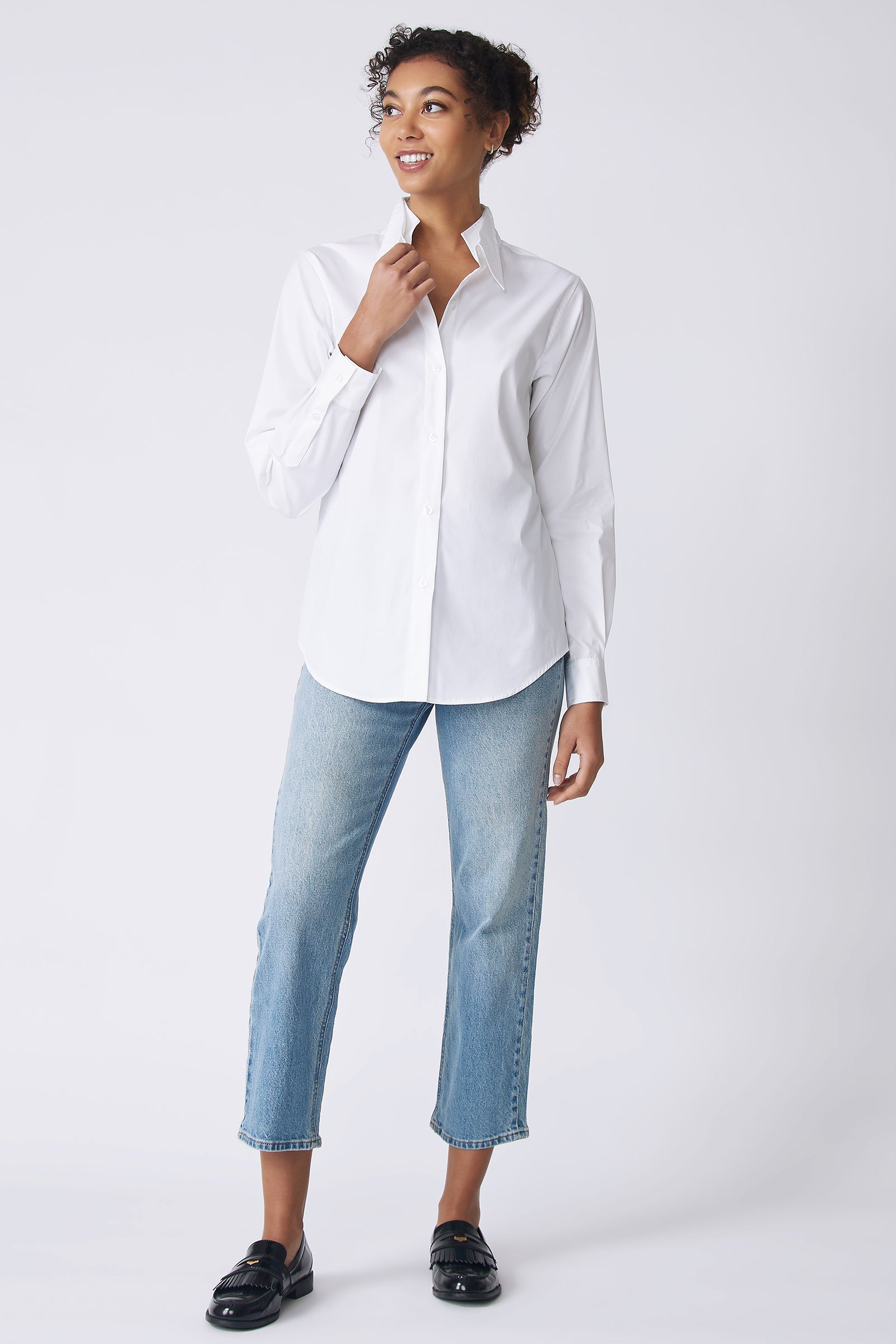 Kal Rieman Double Collar Shirt in white stretch poplin on model front view holding collar
