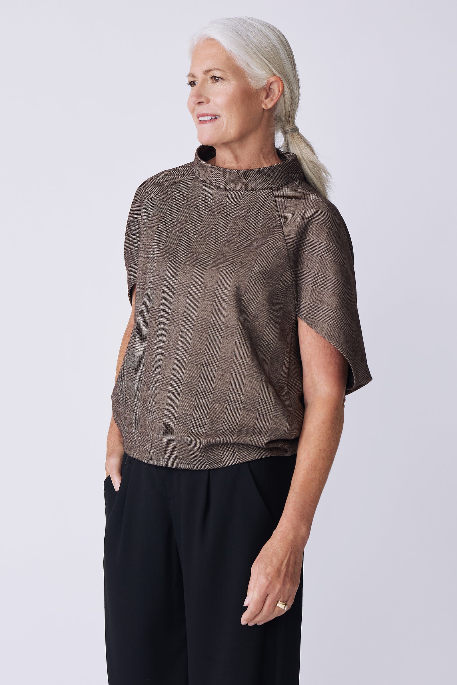 Kal Rieman Elsa Cape Top in brown plaid on model side view