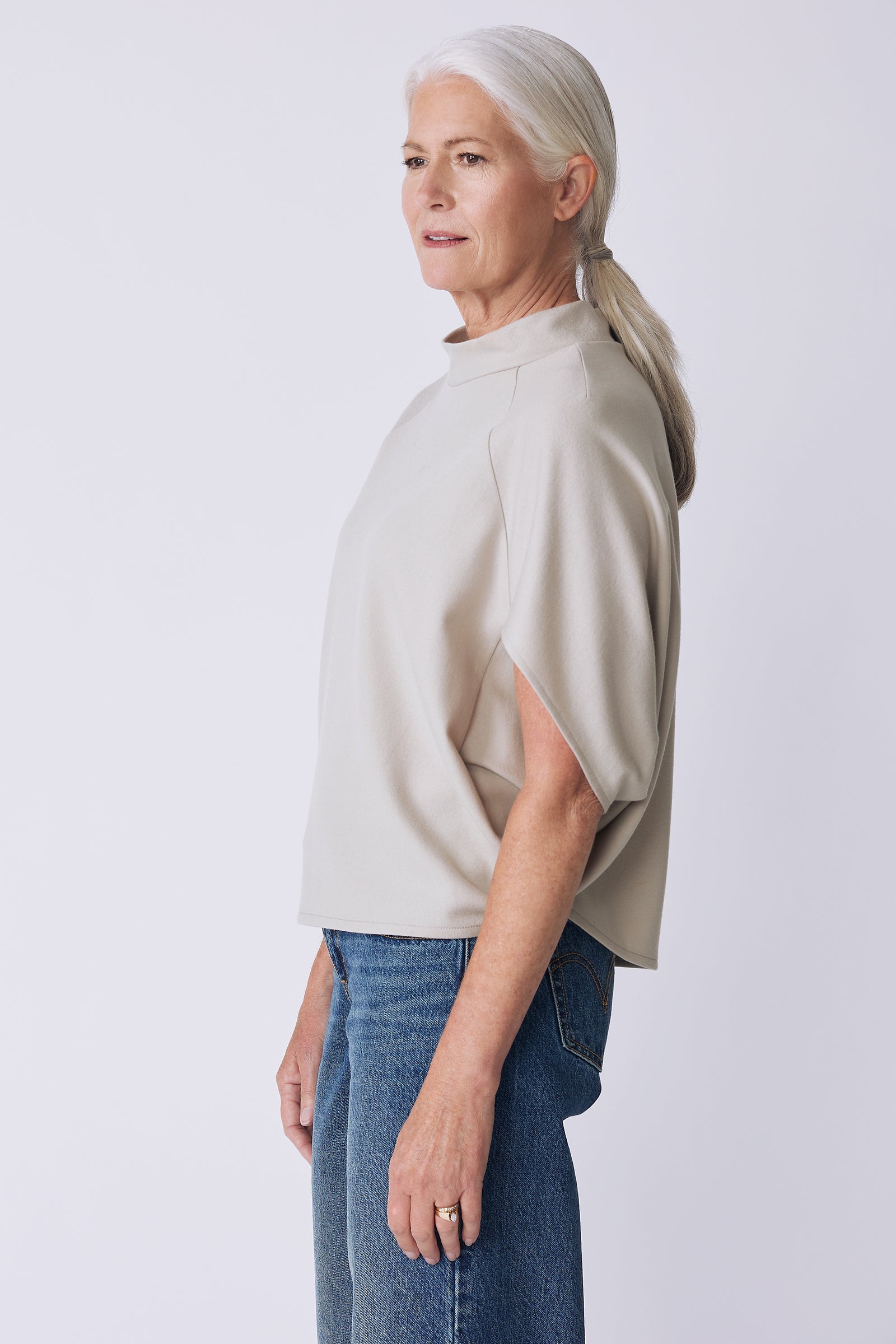 Kal Rieman Elsa Cape Top in mink felted jersey on model side view