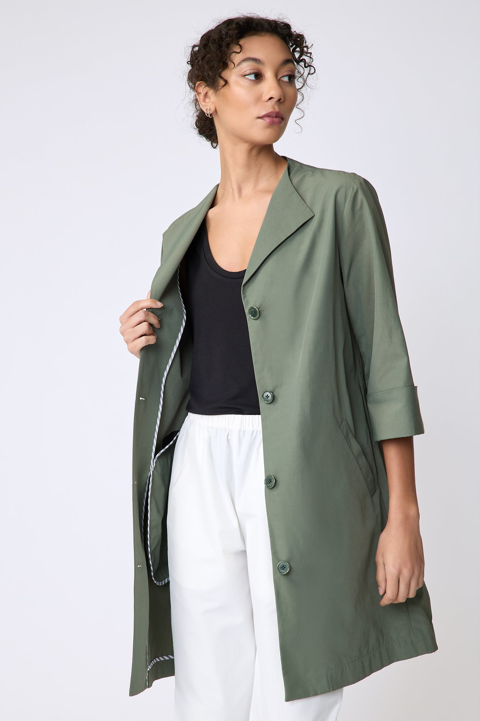 Kal Rieman Else Peacoat in Italian Broadcloth cactus on model side view holding jacket open detail